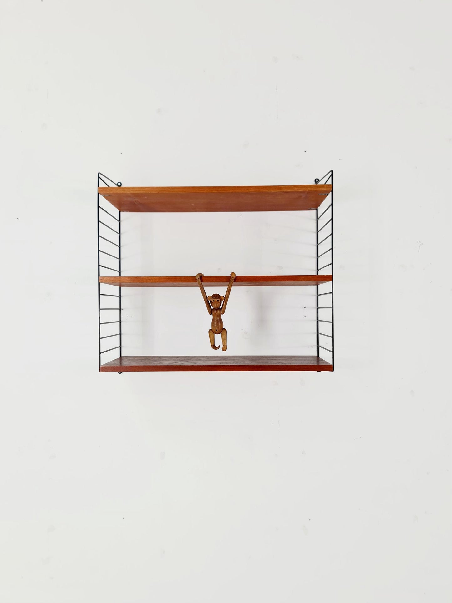 Original MCM Teak shelving system - consists of black lacquered metal ladders, from string Stockholm 1960s