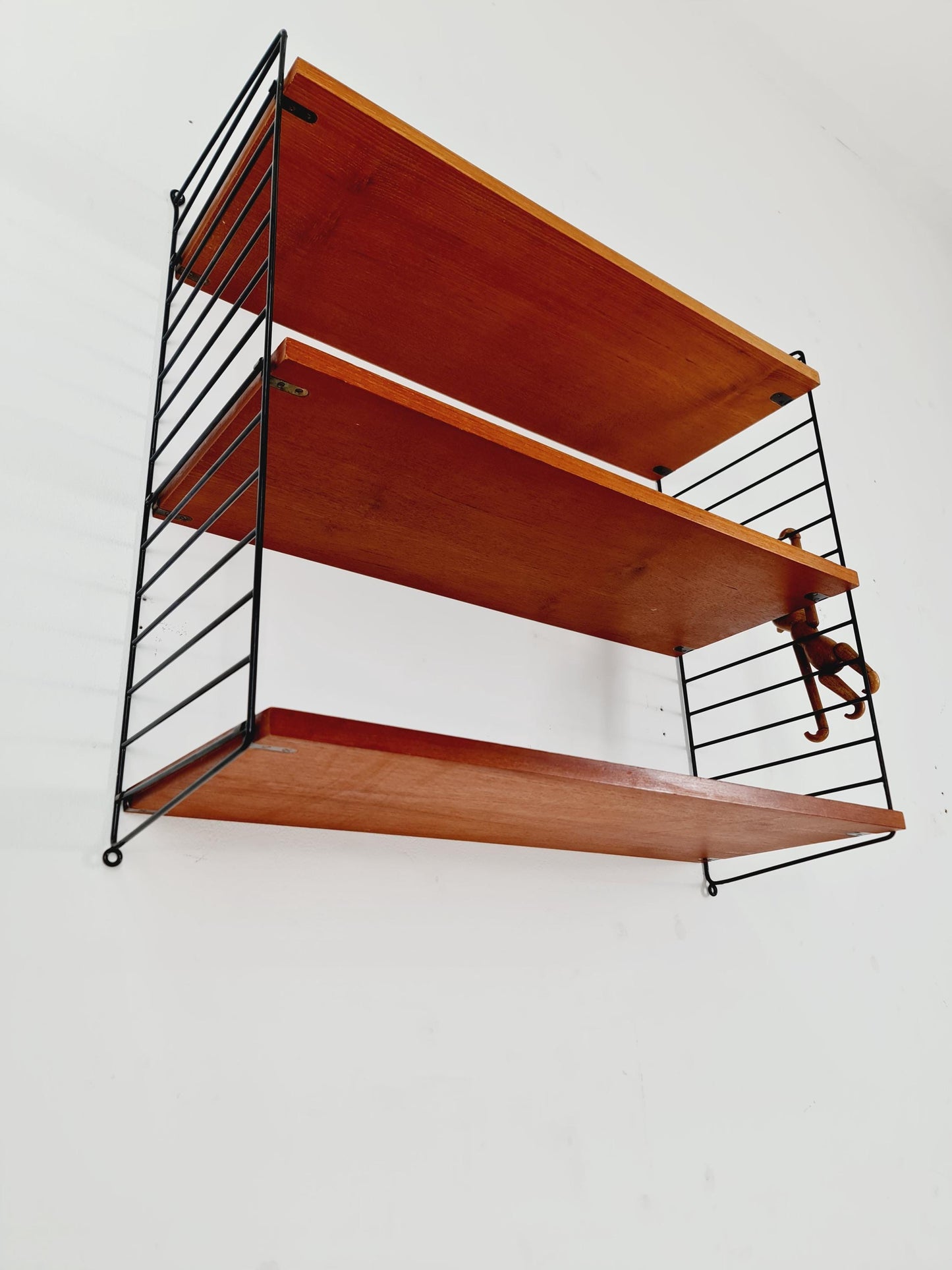 Original MCM Teak shelving system - consists of black lacquered metal ladders, from string Stockholm 1960s