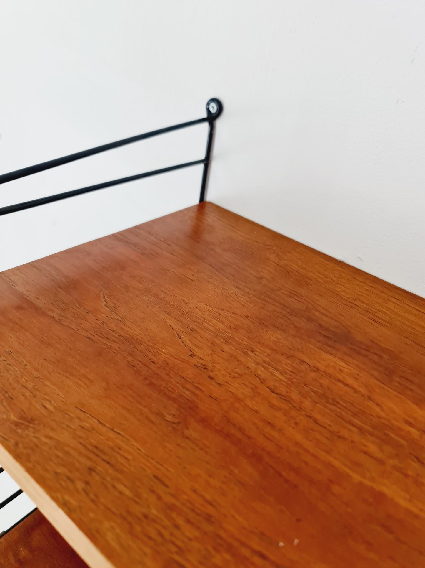 Original MCM Teak shelving system - consists of black lacquered metal ladders, from string Stockholm 1960s
