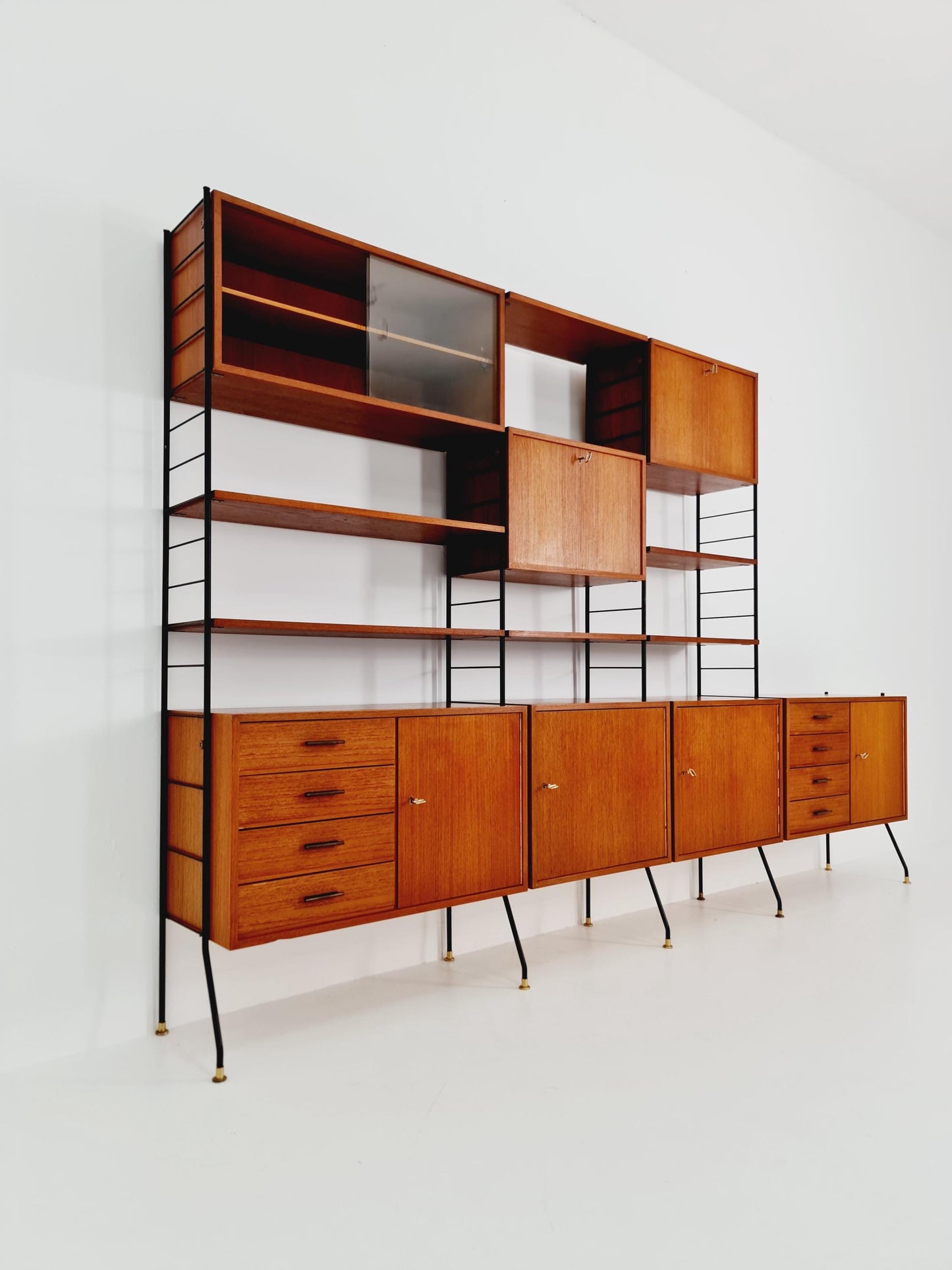 Freestanding string shelf-system unit bookcase teak & metal by Silverschild Germany, 1950s