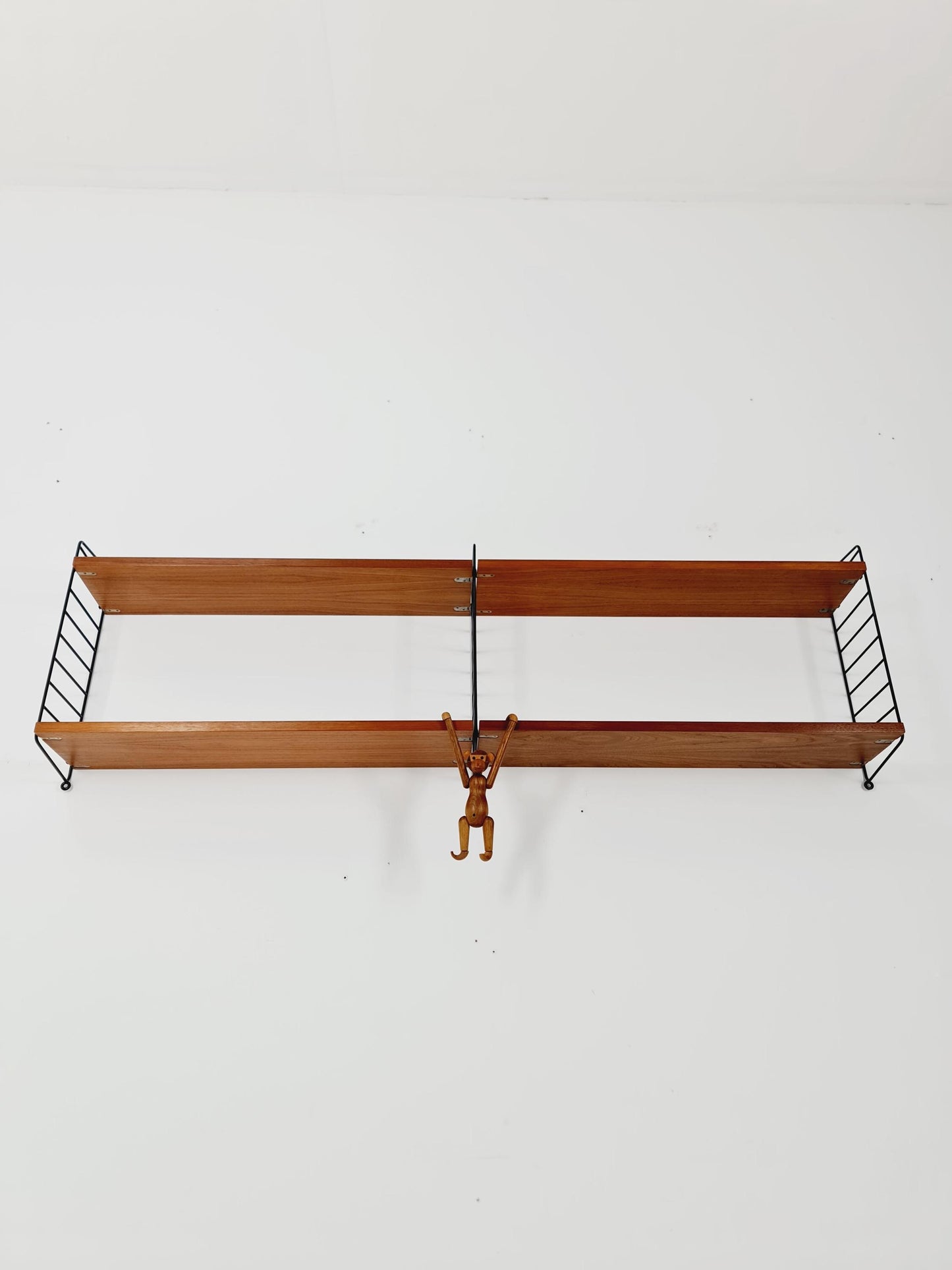 Original MCM Teak shelving system - consists of Black lacquered metal ladders, from string Stockholm 1960s
