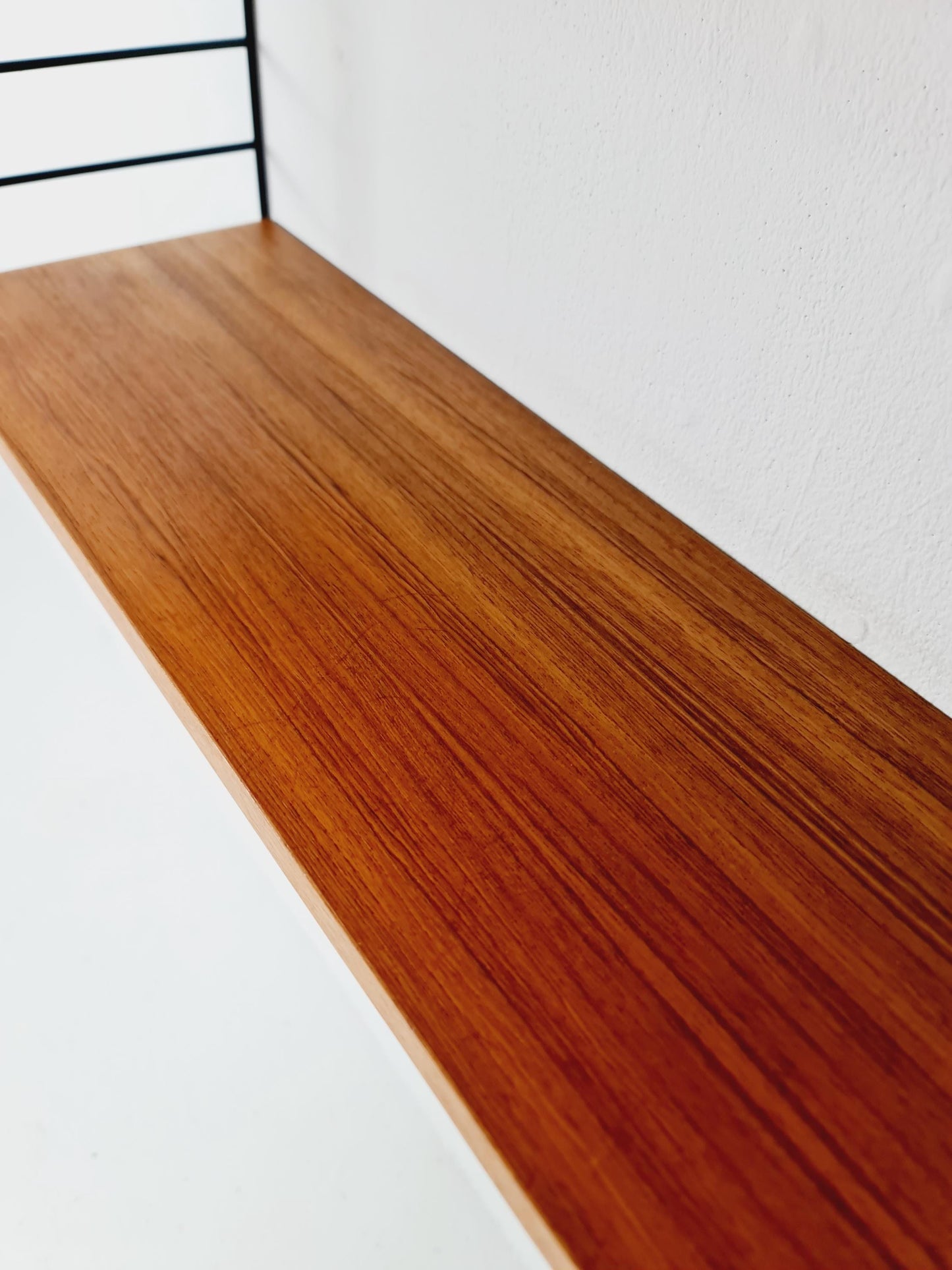 Original MCM Teak shelving system - consists of Black lacquered metal ladders, from string Stockholm 1960s