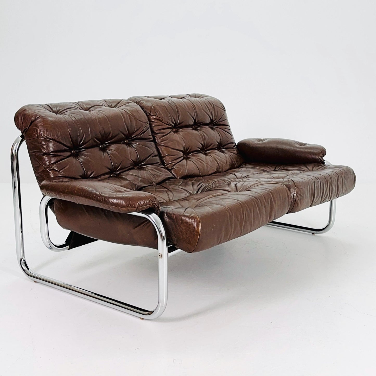 Mid century 2-Seater / tubular frame brown leather sofa "BORKUM" by Johan Bertil Häggström for Ikea 1970s
