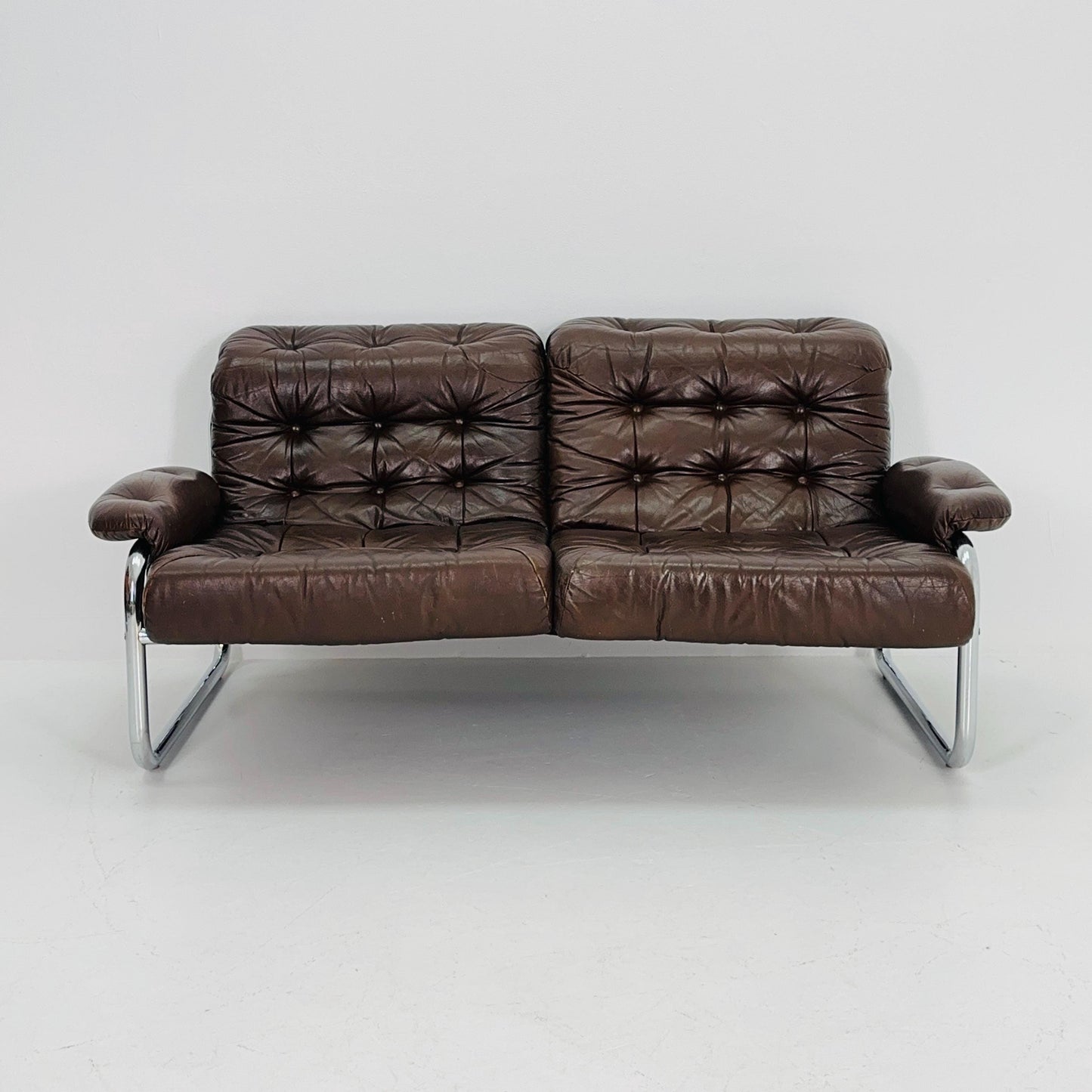 Mid century 2-Seater / tubular frame brown leather sofa "BORKUM" by Johan Bertil Häggström for Ikea 1970s