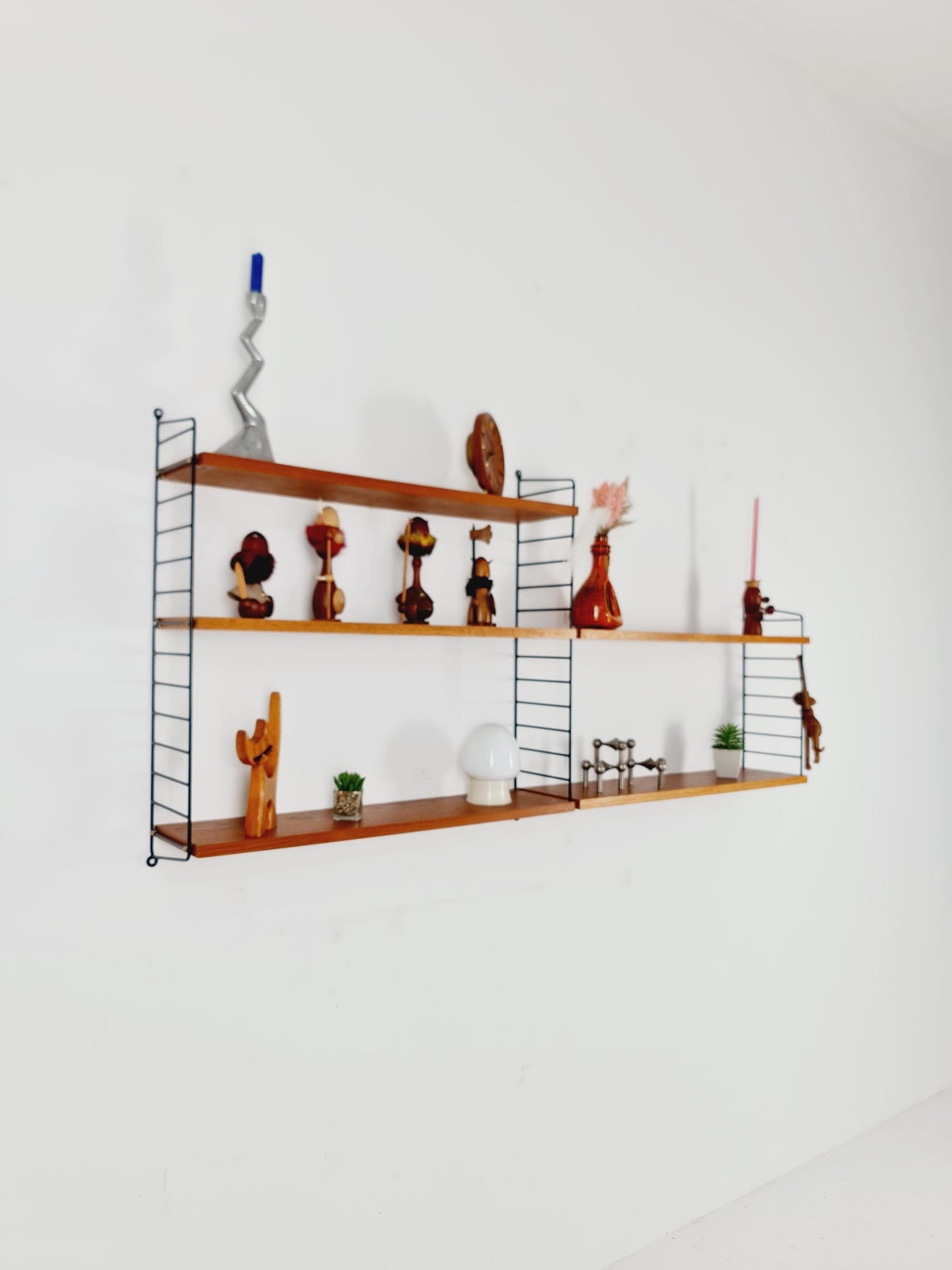 Original MCM Teak shelving system - consists of Black lacquered metal ladders, from string Stockholm 1960s