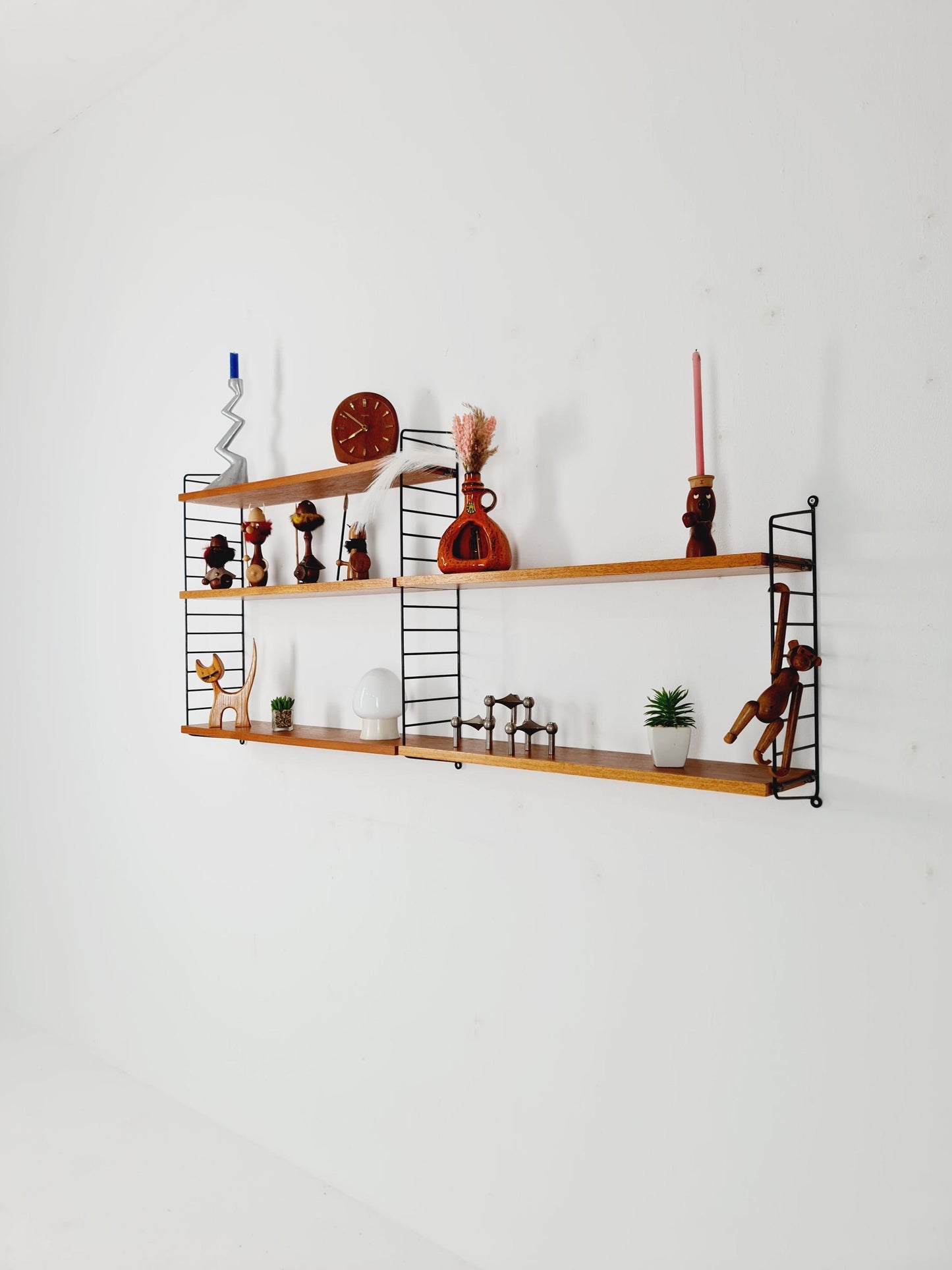 Original MCM Teak shelving system - consists of Black lacquered metal ladders, from string Stockholm 1960s