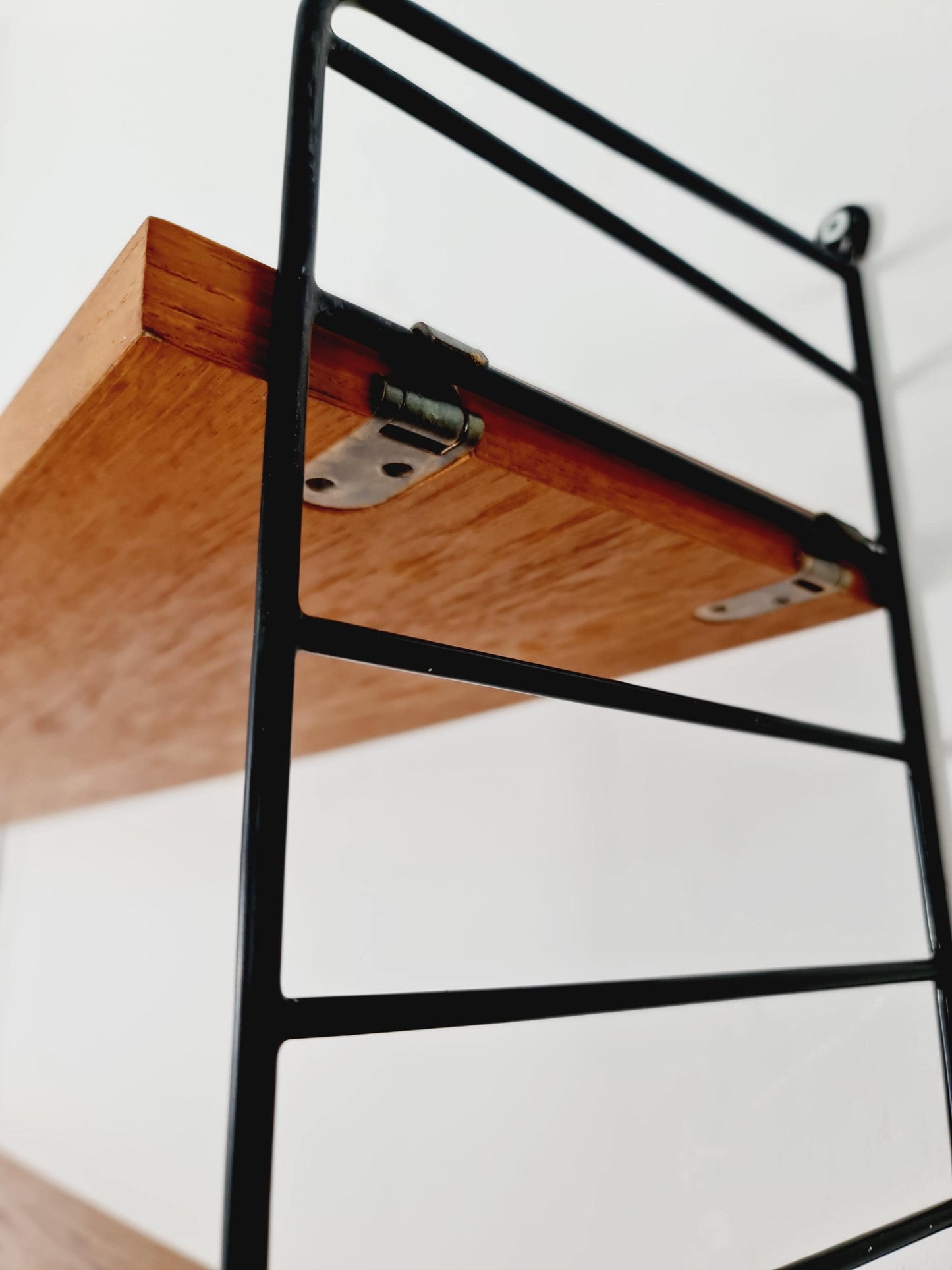 Original MCM Teak shelving system - consists of Black lacquered metal ladders, from string Stockholm 1960s