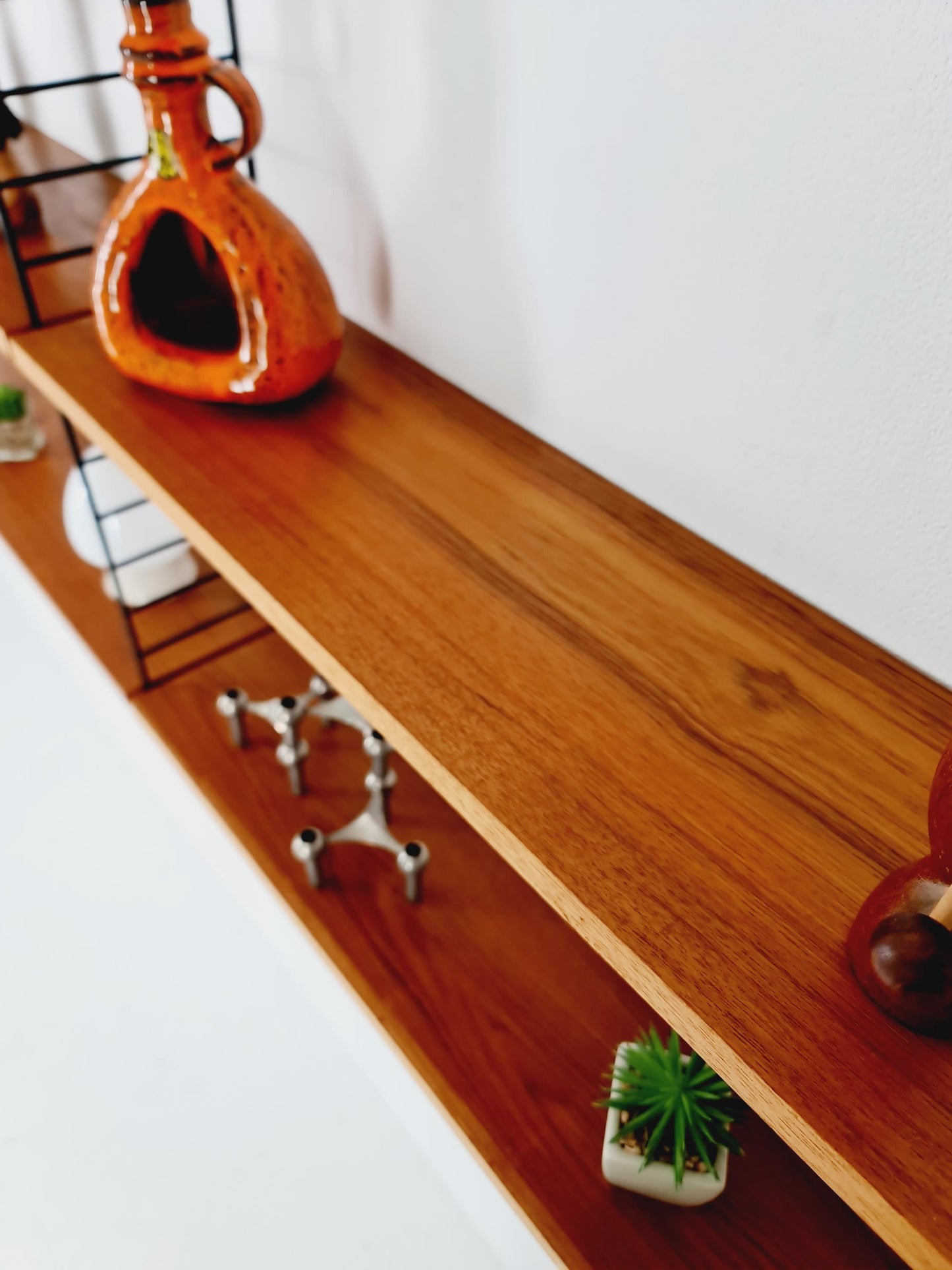 Original MCM Teak shelving system - consists of Black lacquered metal ladders, from string Stockholm 1960s