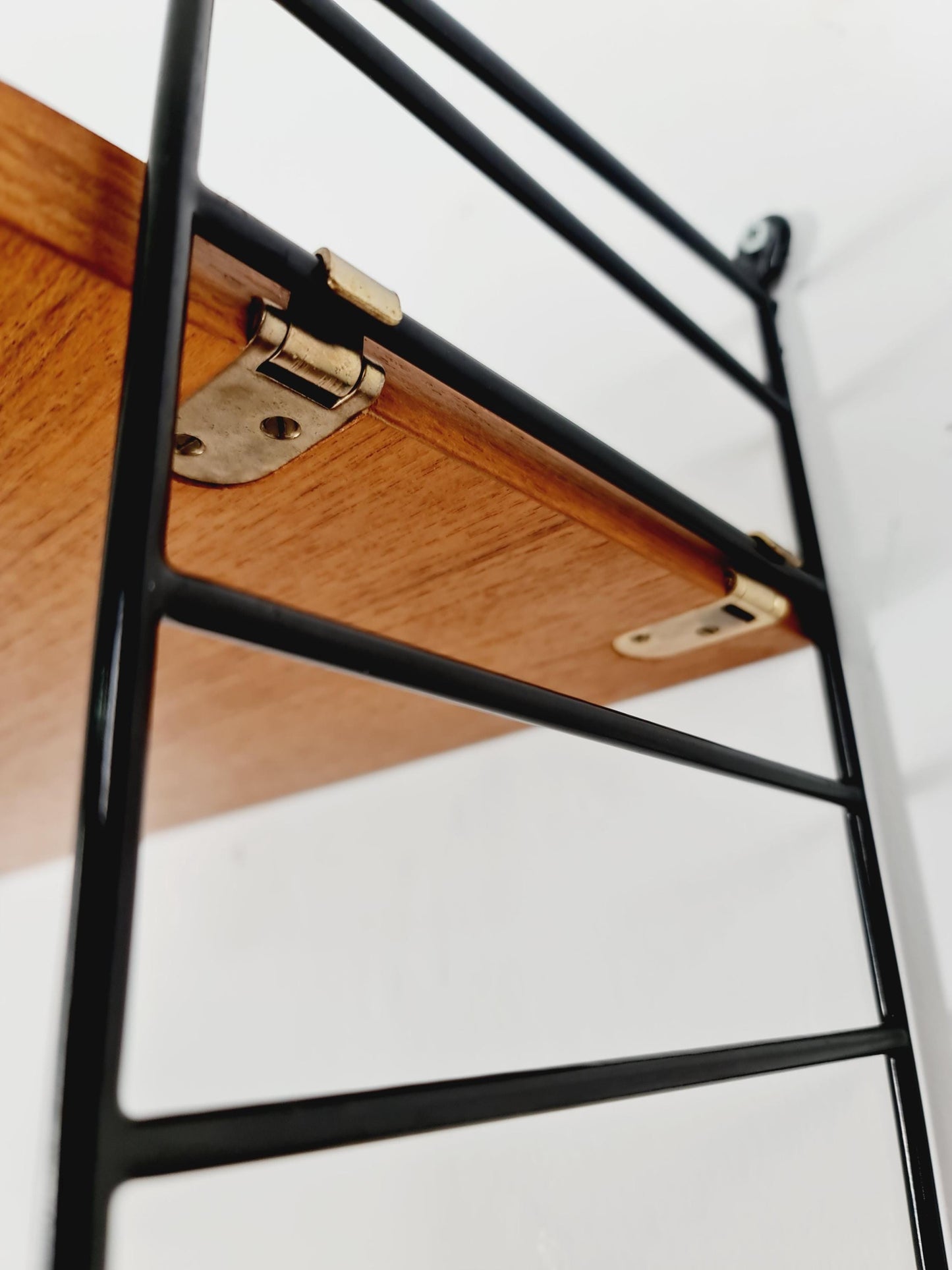 Original MCM Teak shelving system - consists of Black lacquered metal ladders, from string Stockholm 1960s