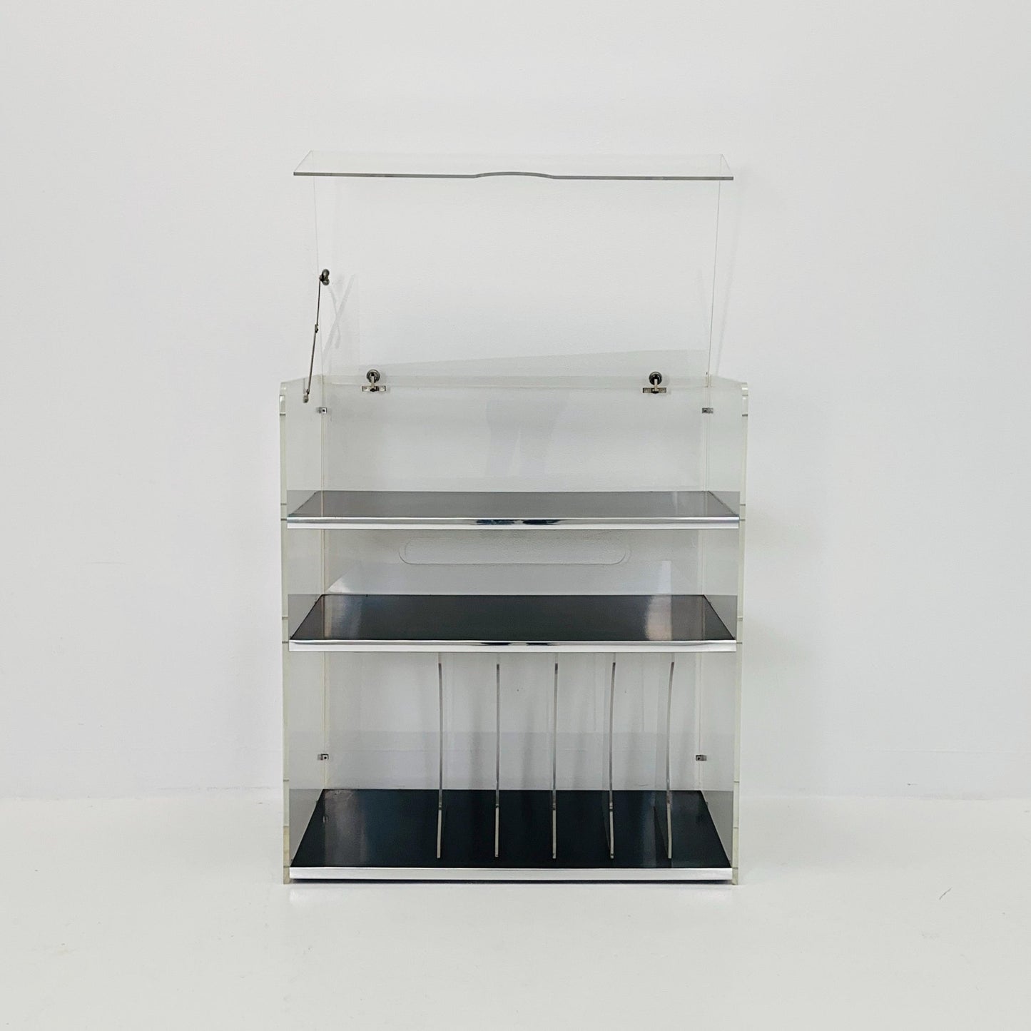 Space age Plexiglass vinyl storage /stand by Michel Dumas for Roche Bobois 1970s