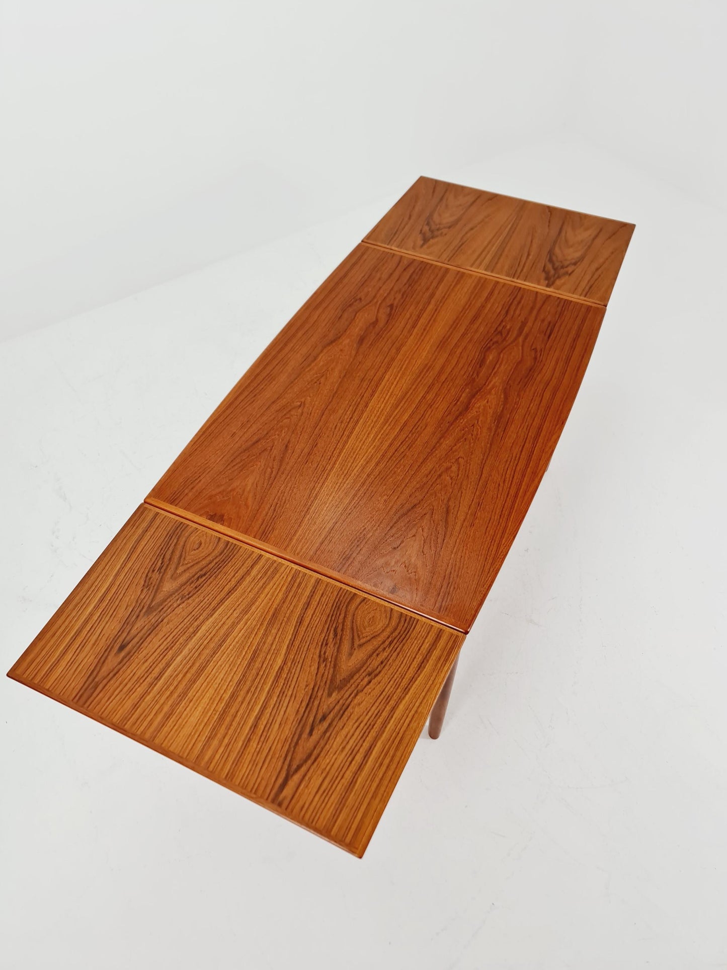 Danish Henning Kjaernulf rectangular teak table with two extension leaves, Denmark 1960s