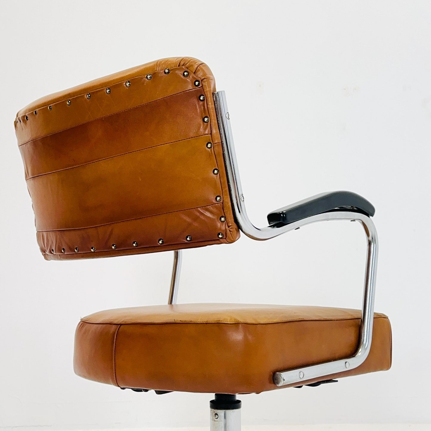 Mid century cognac leather swivel desk armchair 1980s Germany