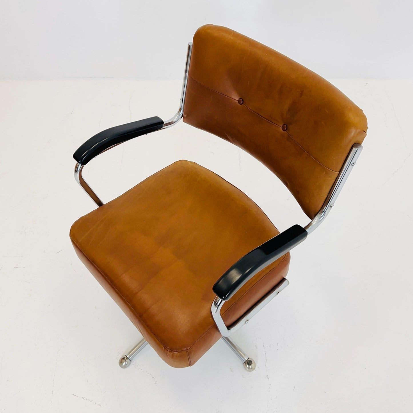 Mid century cognac leather swivel desk armchair 1980s Germany