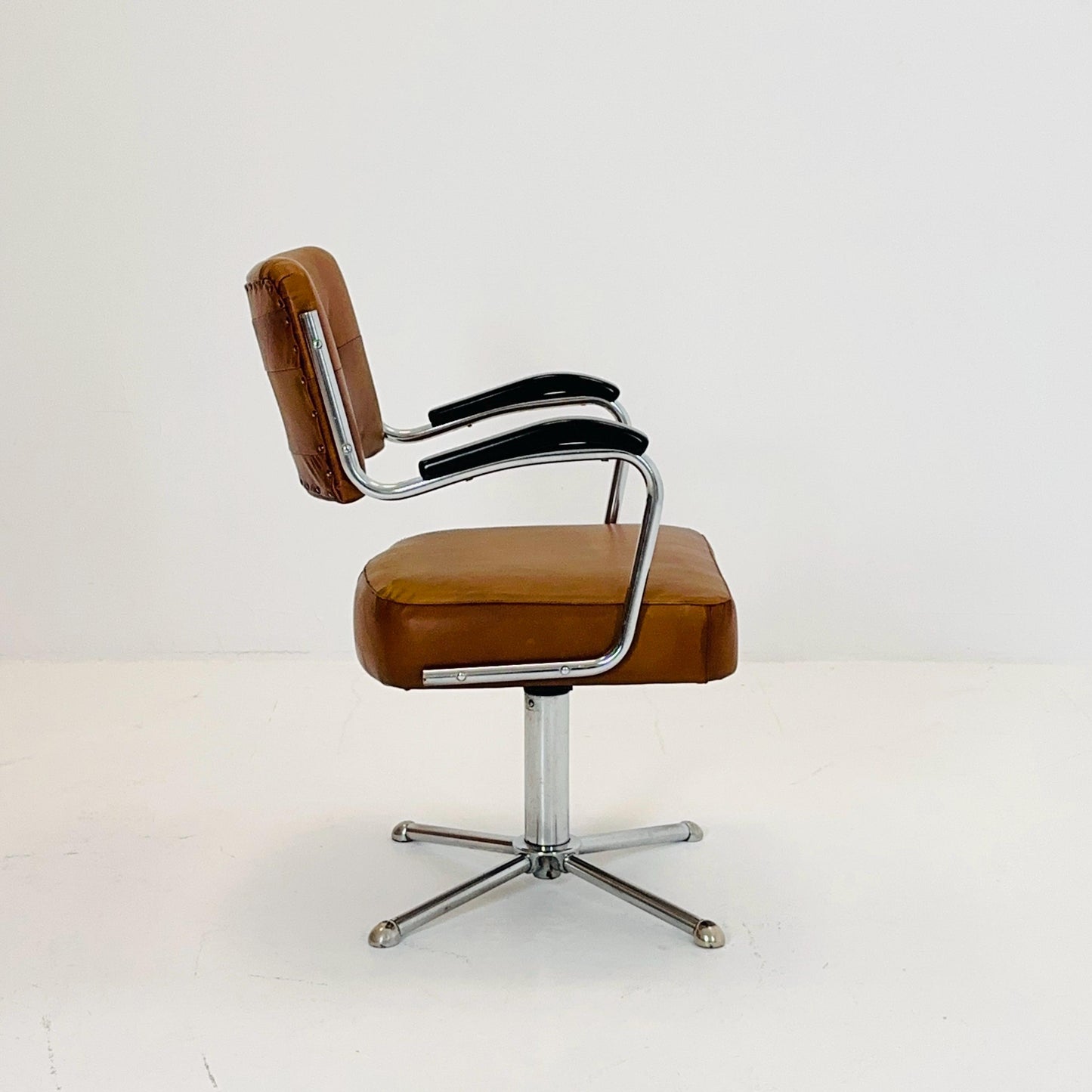 Mid century cognac leather swivel desk armchair 1980s Germany