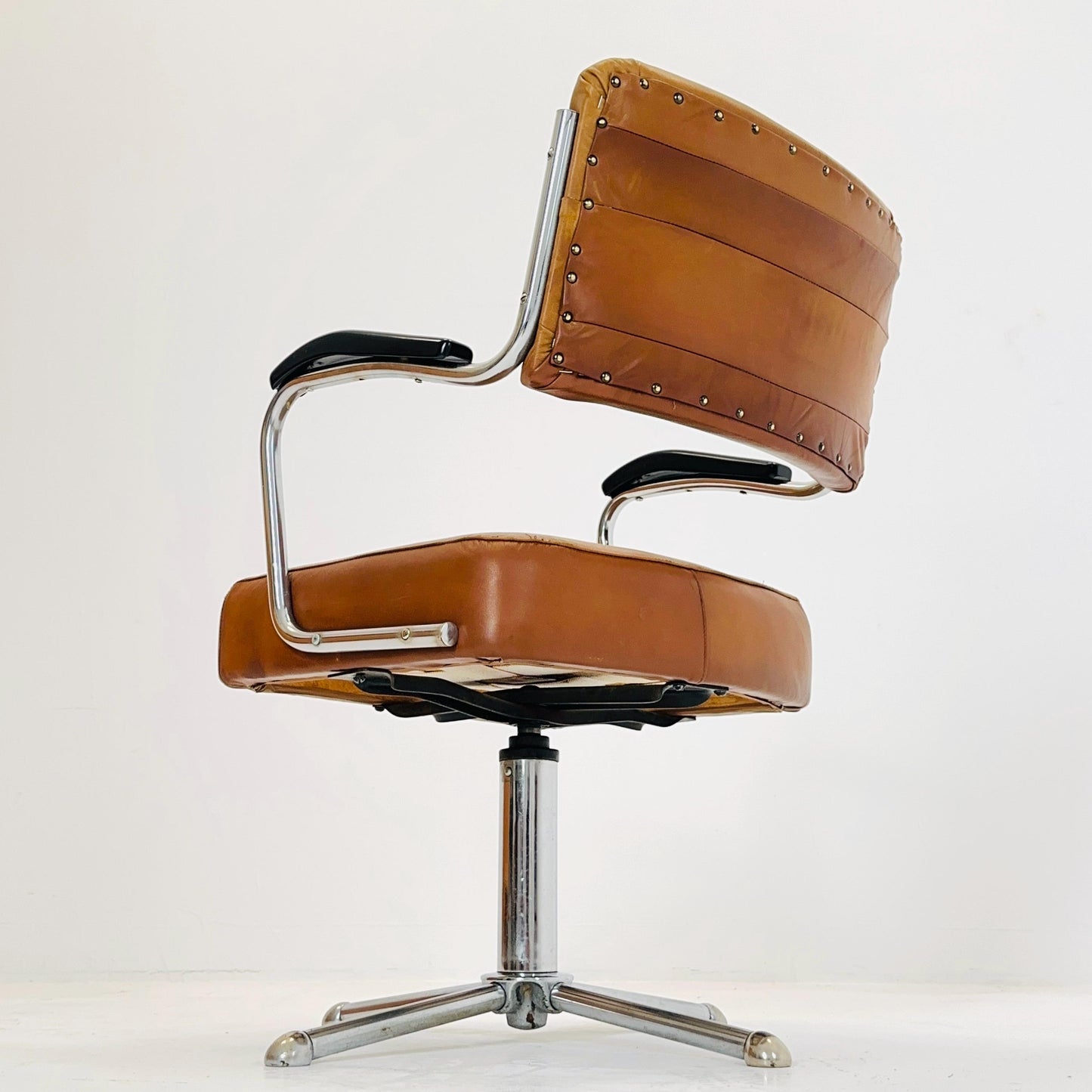 Mid century cognac leather swivel desk armchair 1980s Germany