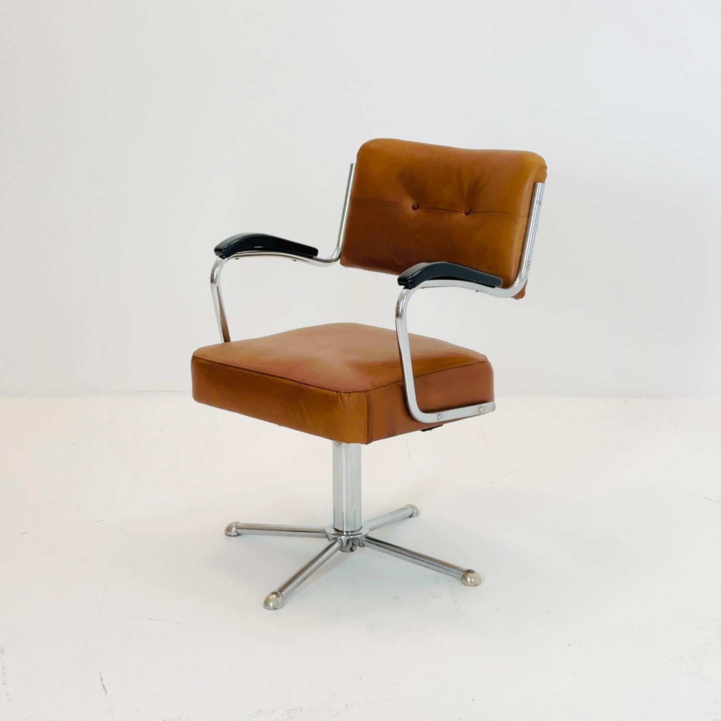 Mid century cognac leather swivel desk armchair 1980s Germany
