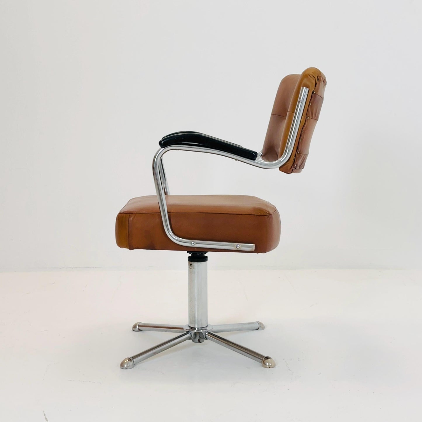 Mid century cognac leather swivel desk armchair 1980s Germany