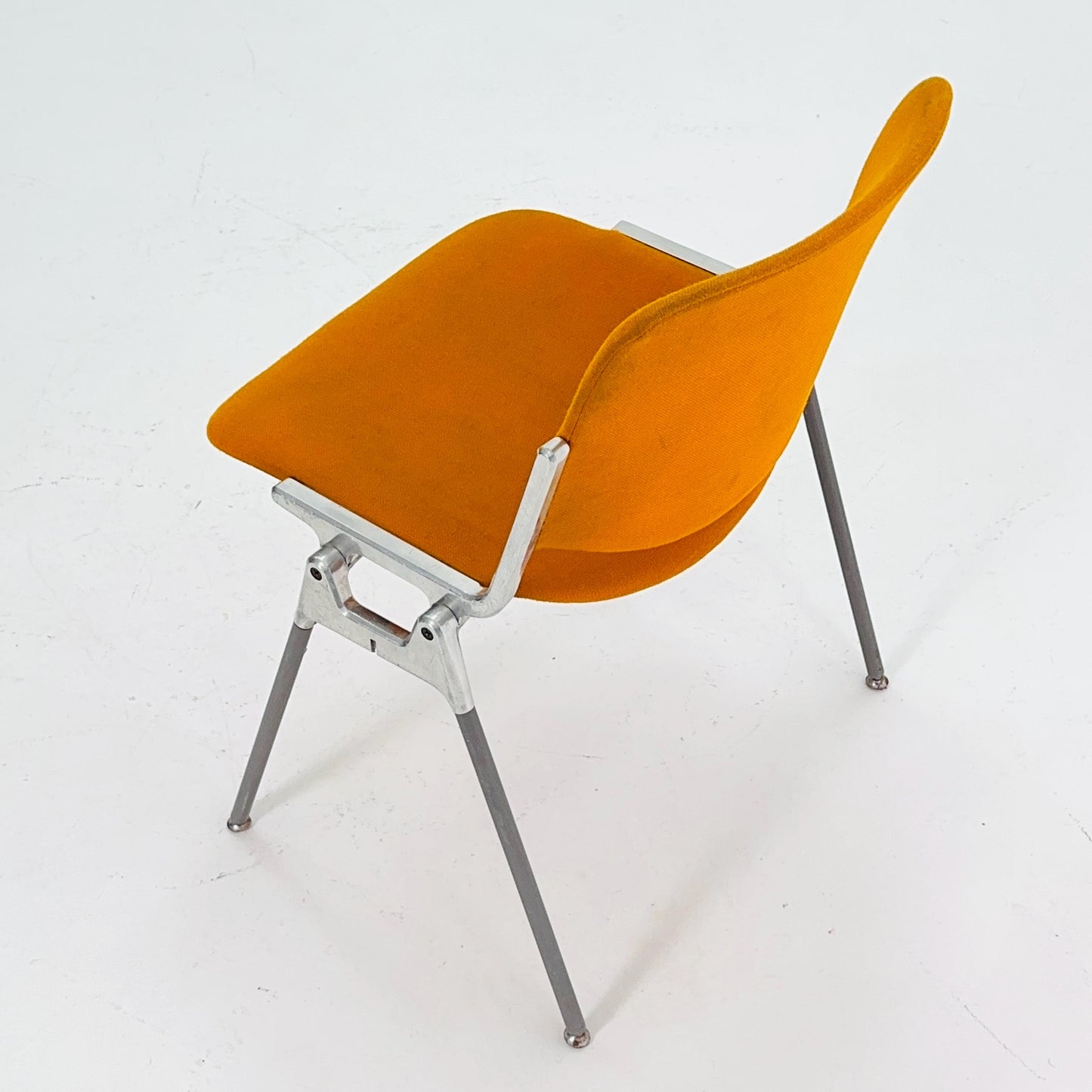 Mid century Stacking Orange fabric chair by Giancarlo Piretti for Anomima Castelli ,Italy 1960s
