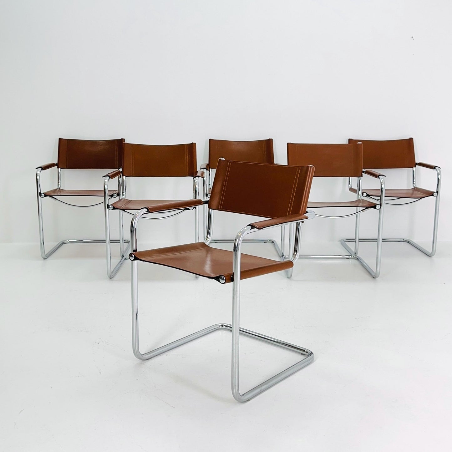 1 of 12 Model MG5 Centro Studi dining cognac leather chairs by Mart Stam & Marcel Breuer for Matteo Grassi, 1980s