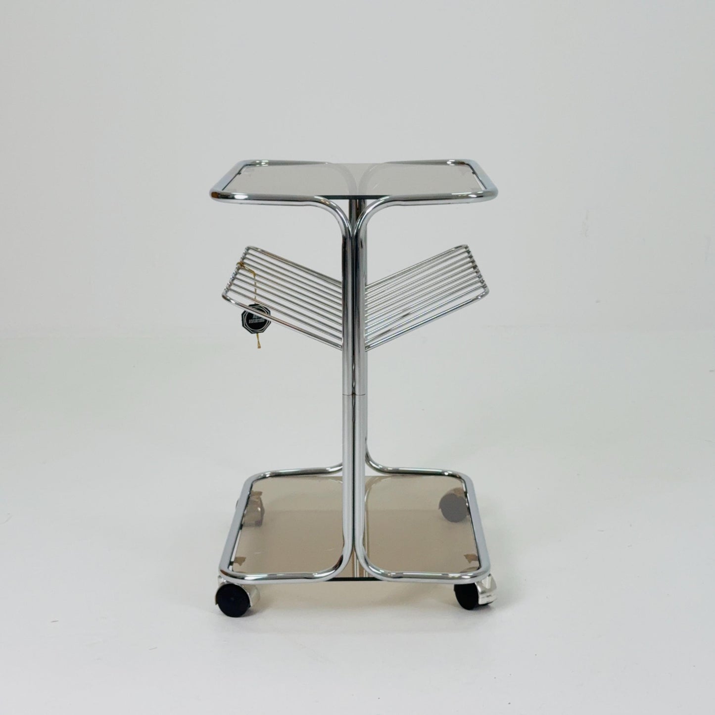 Mid century Chrome bar cart/serving trolley. magazine rack Smoked glass ,Bauhaus Germany 1980s