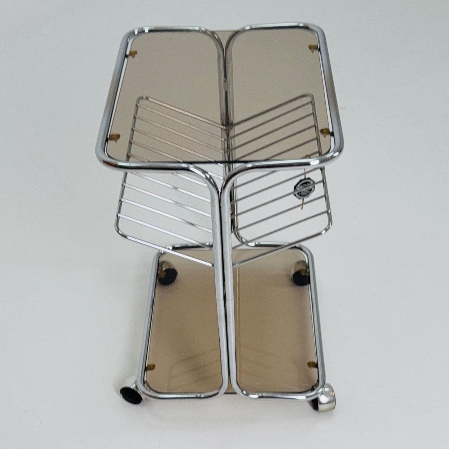 Mid century Chrome bar cart/serving trolley. magazine rack Smoked glass ,Bauhaus Germany 1980s
