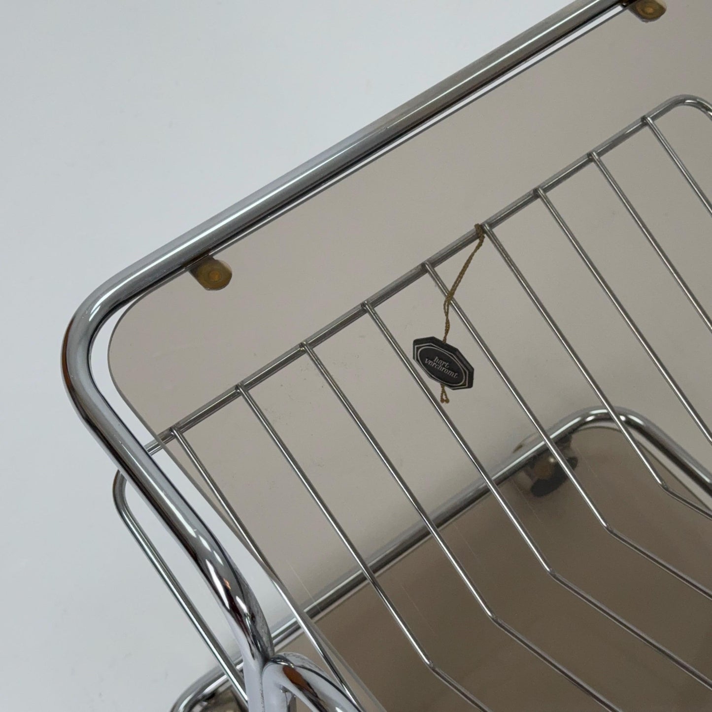 Mid century Chrome bar cart/serving trolley. magazine rack Smoked glass ,Bauhaus Germany 1980s