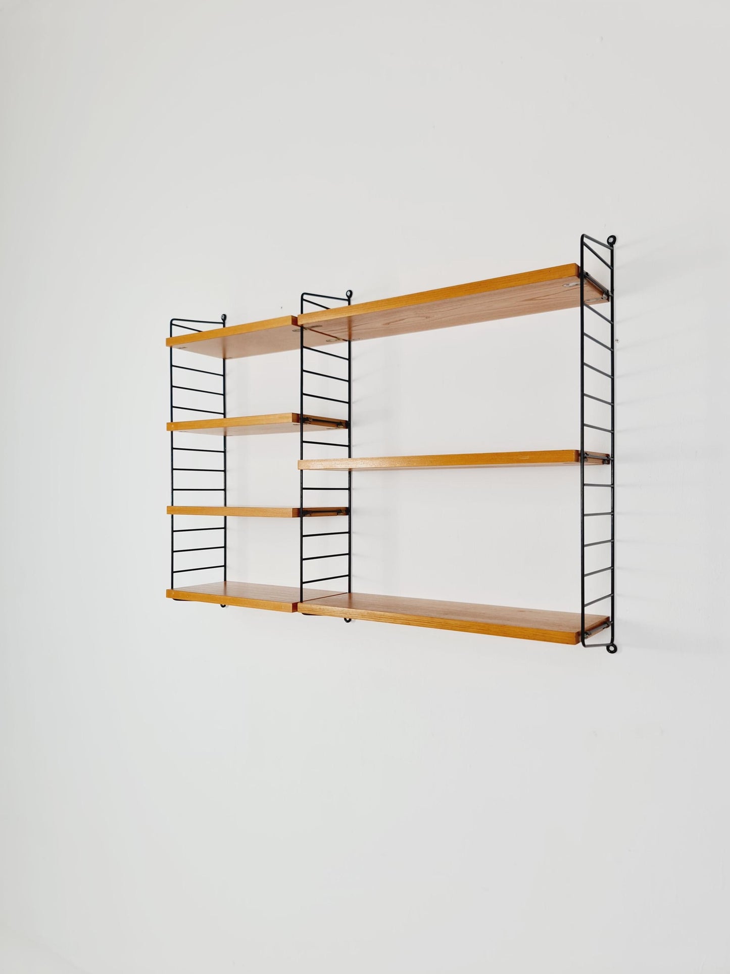 Original MCM Ash wood shelving system - consists of Black lacquered metal ladders, from string Stockholm 1960s