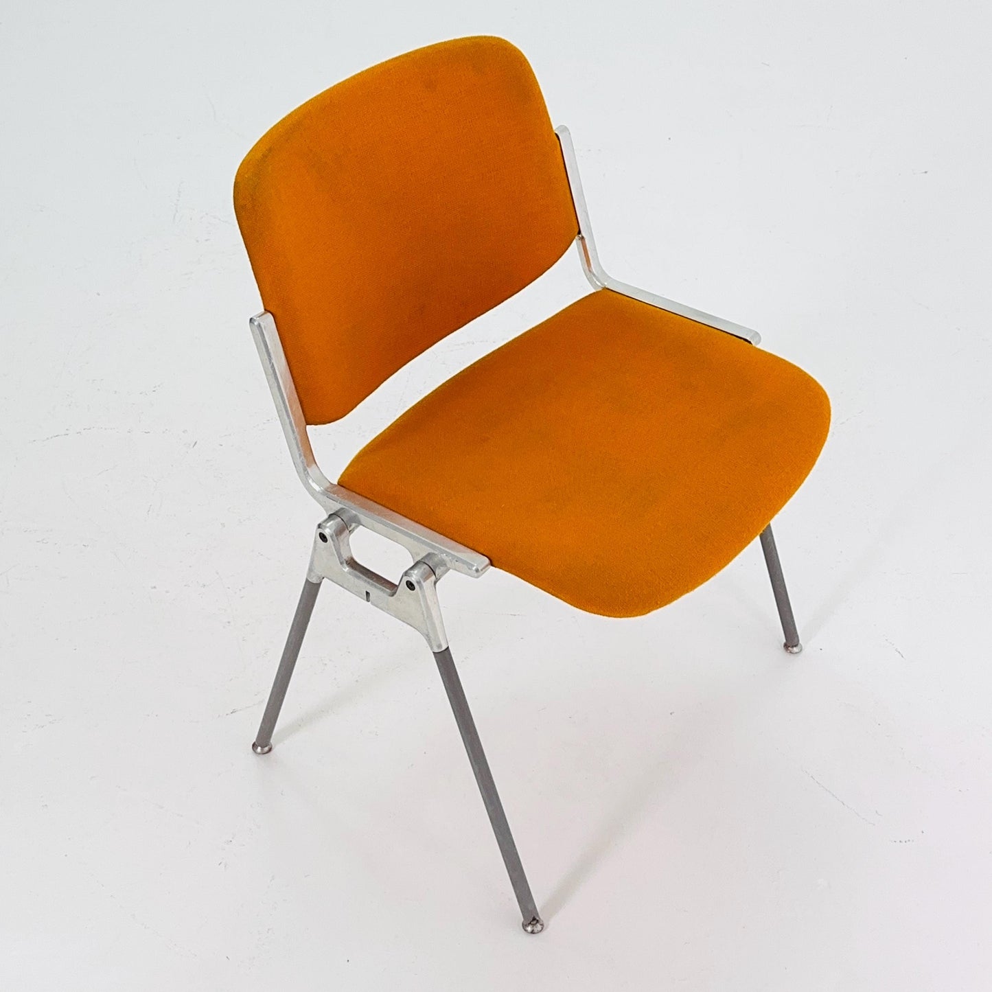Mid century Stacking Orange fabric chair by Giancarlo Piretti for Anomima Castelli ,Italy 1960s