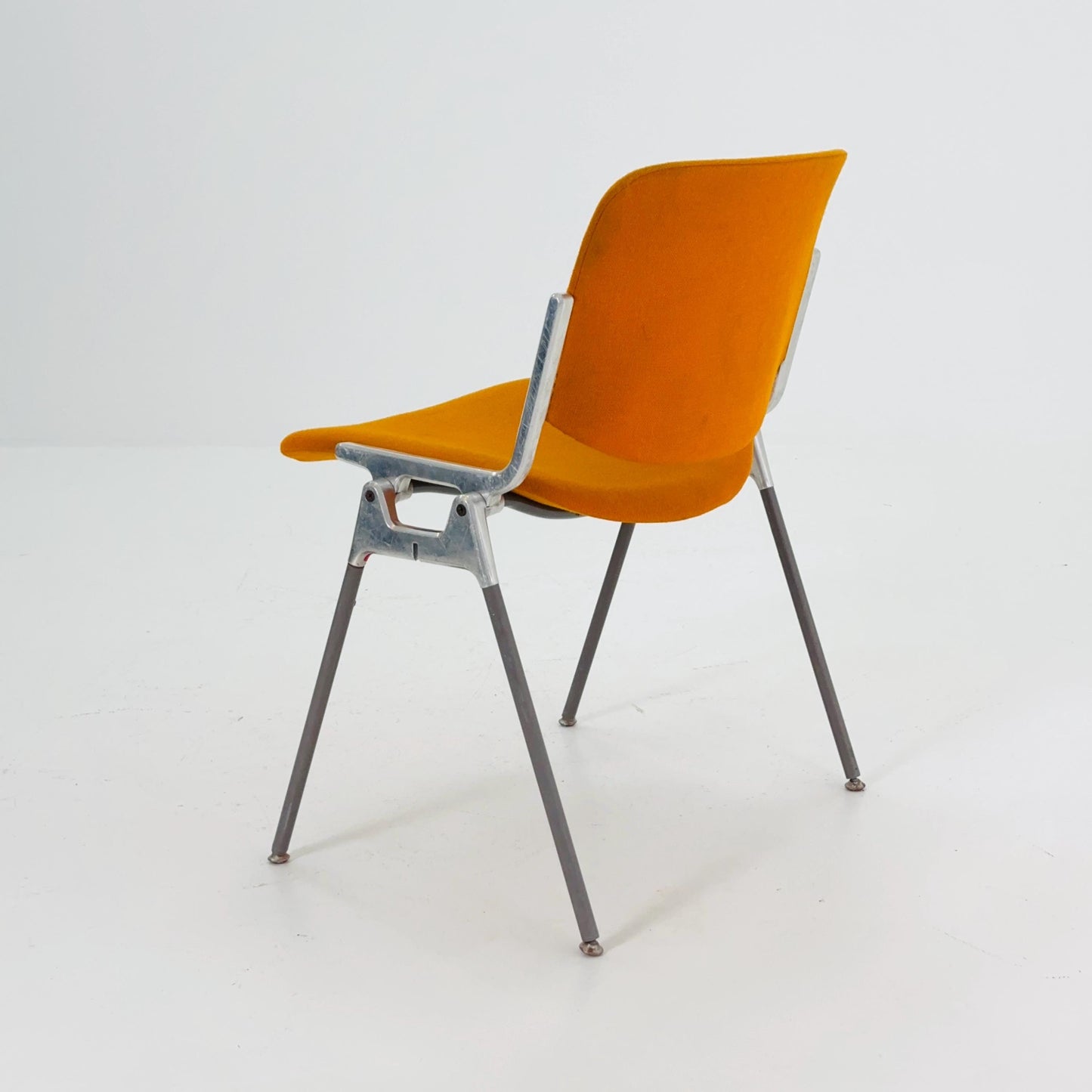 Mid century Stacking Orange fabric chair by Giancarlo Piretti for Anomima Castelli ,Italy 1960s