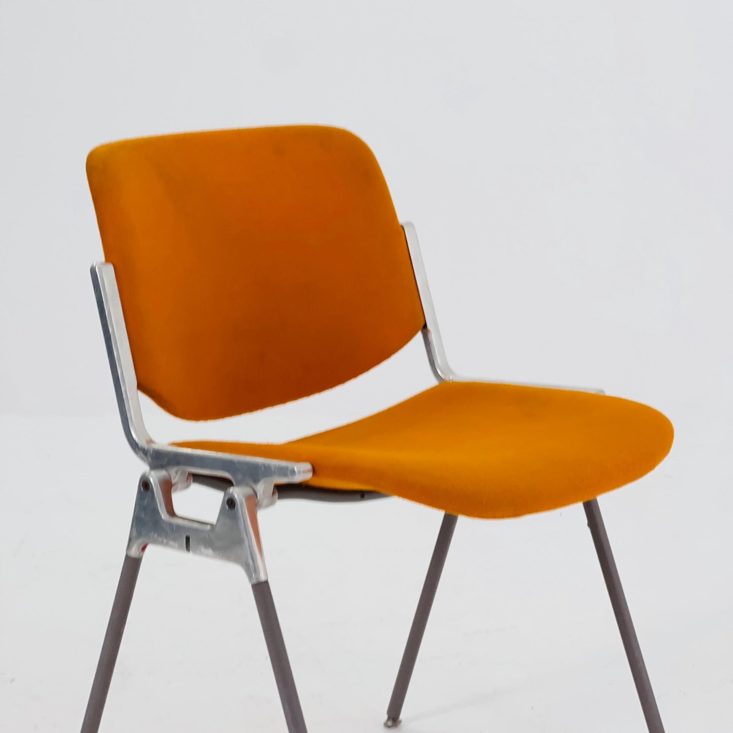 Mid century Stacking Orange fabric chair by Giancarlo Piretti for Anomima Castelli ,Italy 1960s