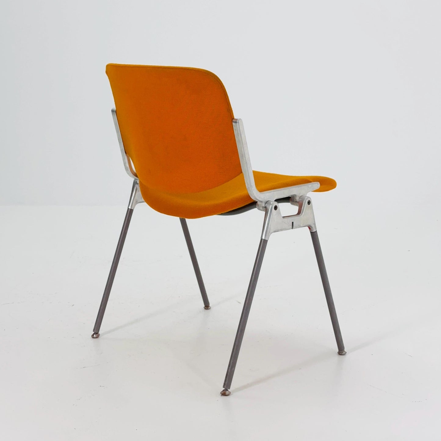 Mid century Stacking Orange fabric chair by Giancarlo Piretti for Anomima Castelli ,Italy 1960s