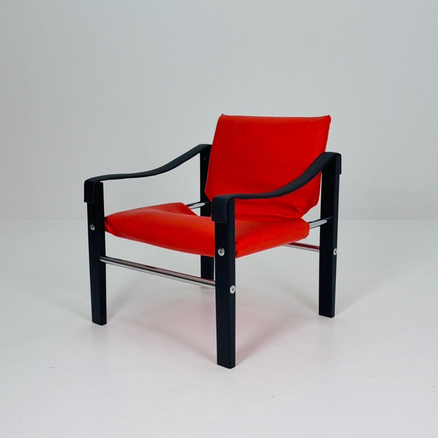 Mid century Red leather Safari armchairs from Arkana by Maurice Burke, United Kingdom 1970s Scotland
