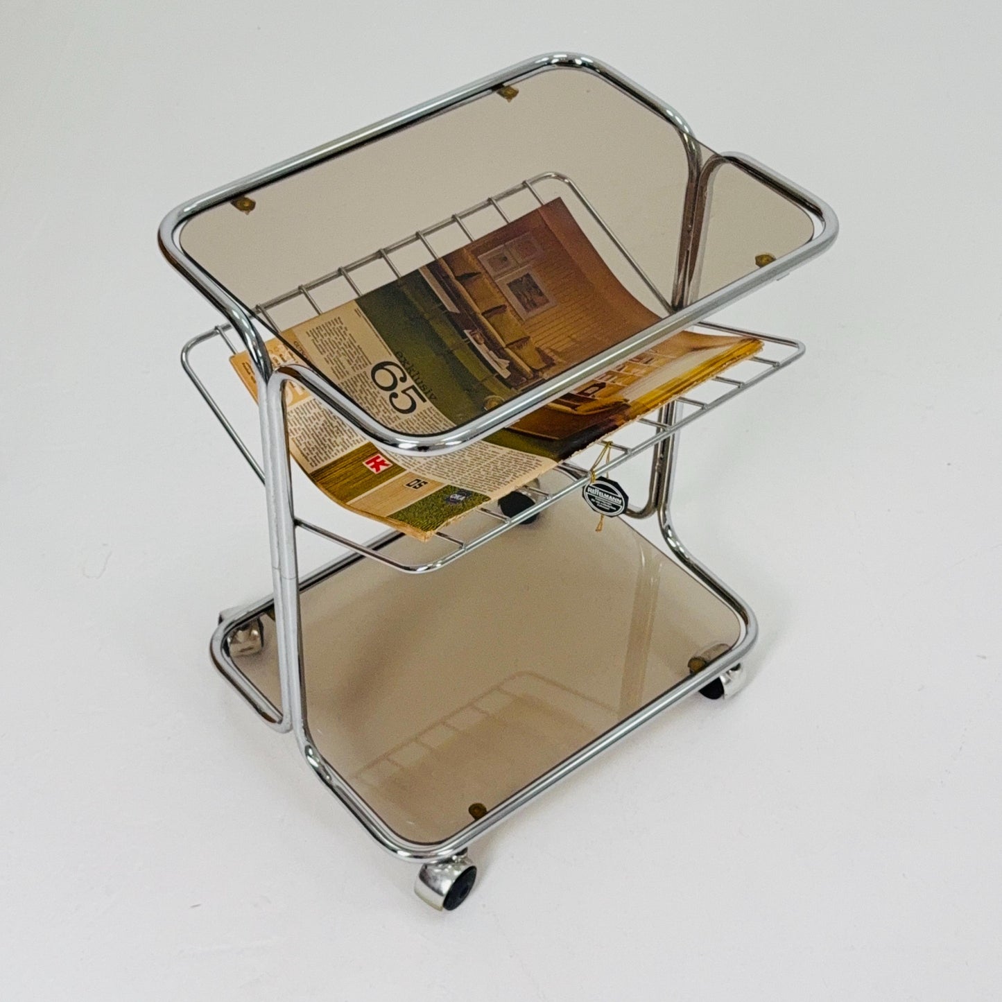 Mid century Chrome bar cart/serving trolley. magazine rack Smoked glass ,Bauhaus Germany 1980s