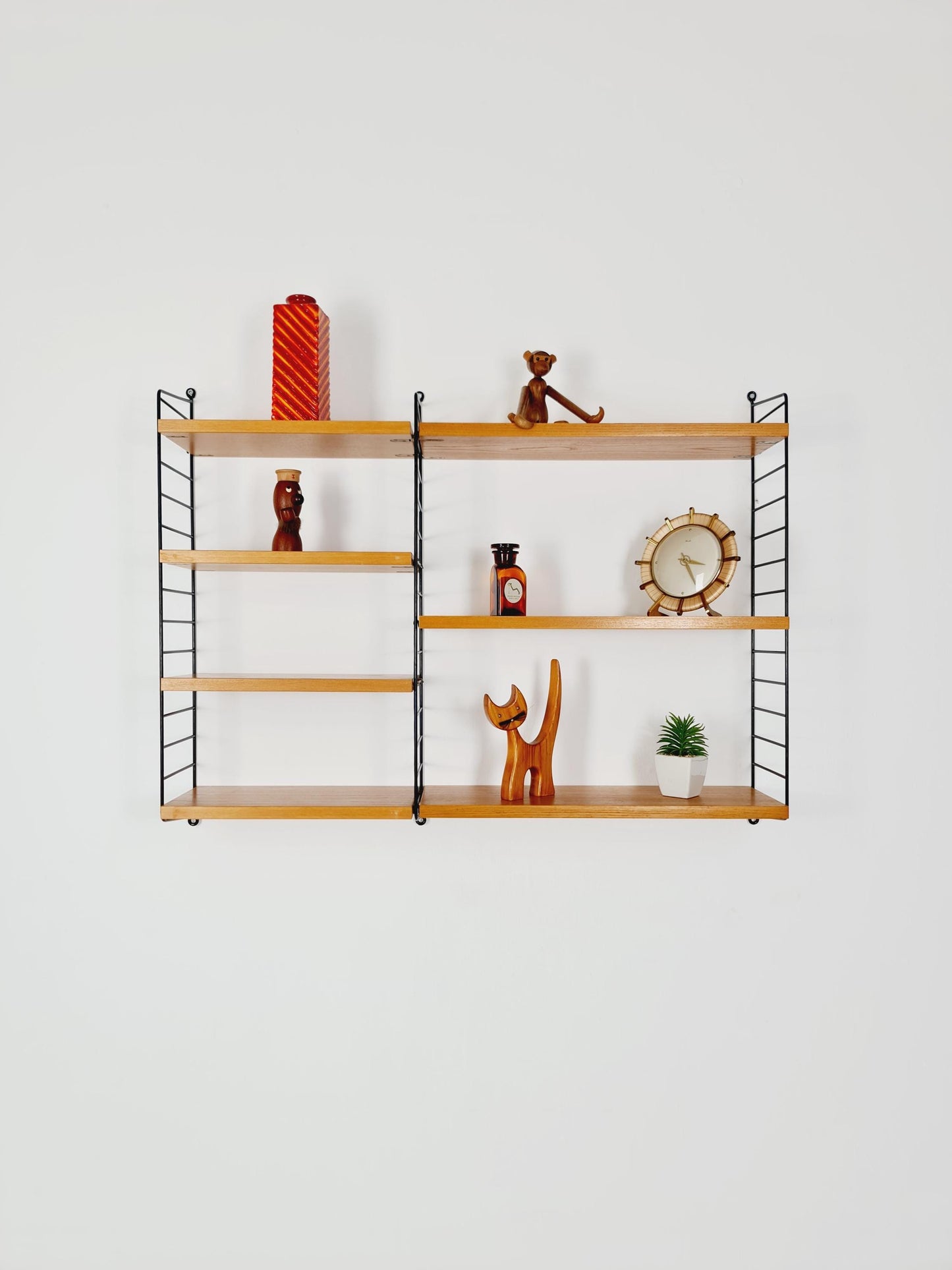 Original MCM Ash wood shelving system - consists of Black lacquered metal ladders, from string Stockholm 1960s