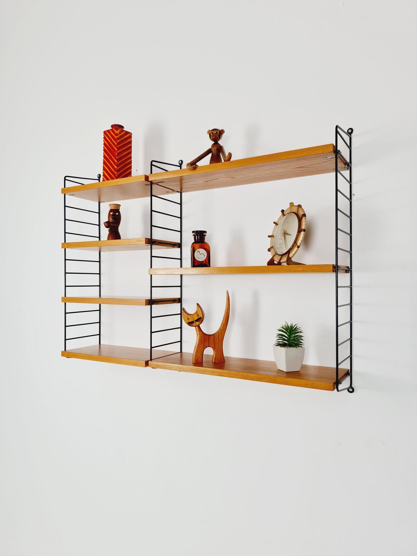 Original MCM Ash wood shelving system - consists of Black lacquered metal ladders, from string Stockholm 1960s