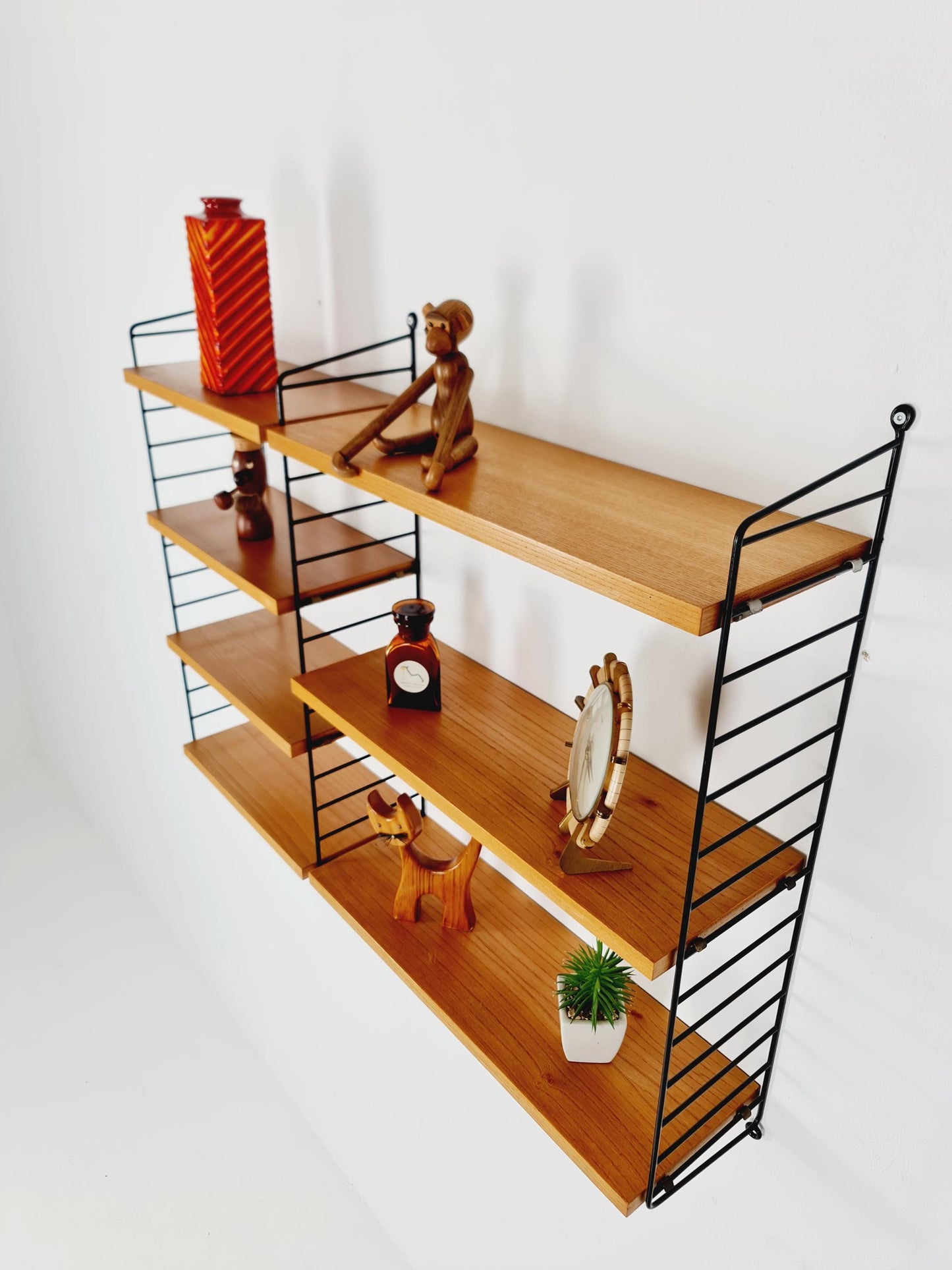 Original MCM Ash wood shelving system - consists of Black lacquered metal ladders, from string Stockholm 1960s