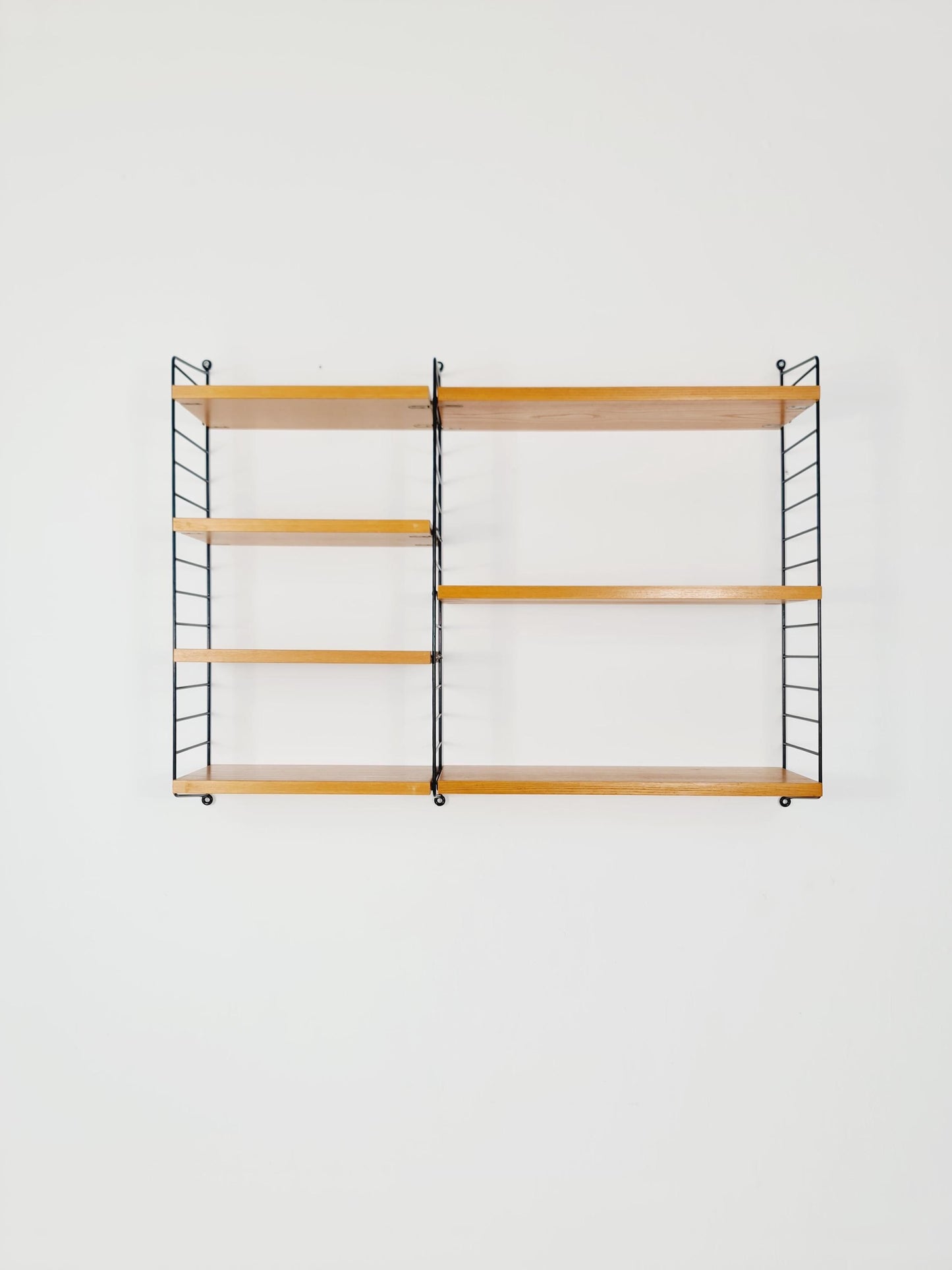 Original MCM Ash wood shelving system - consists of Black lacquered metal ladders, from string Stockholm 1960s