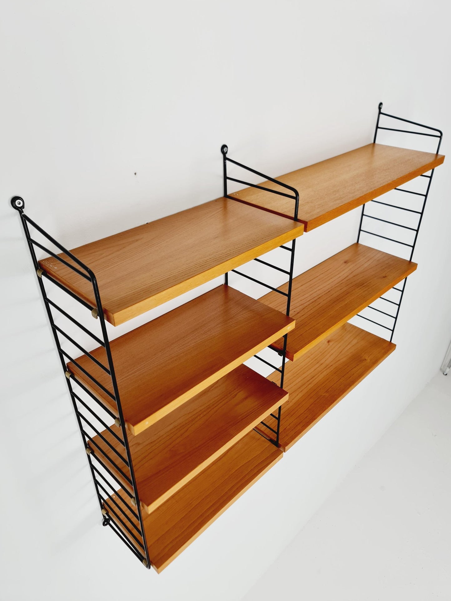 Original MCM Ash wood shelving system - consists of Black lacquered metal ladders, from string Stockholm 1960s