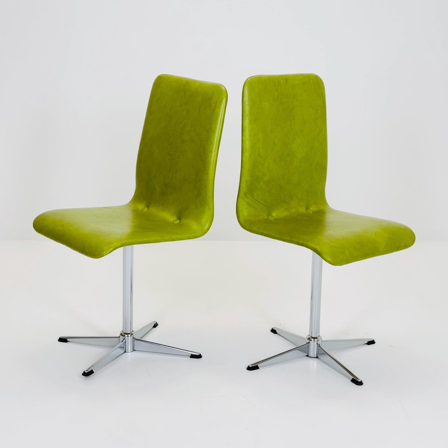 1 of 2 Bauhaus Mid-Century Lounge Swivel Chair — Chrome Base & Green faux leather — Germany, 1980s
