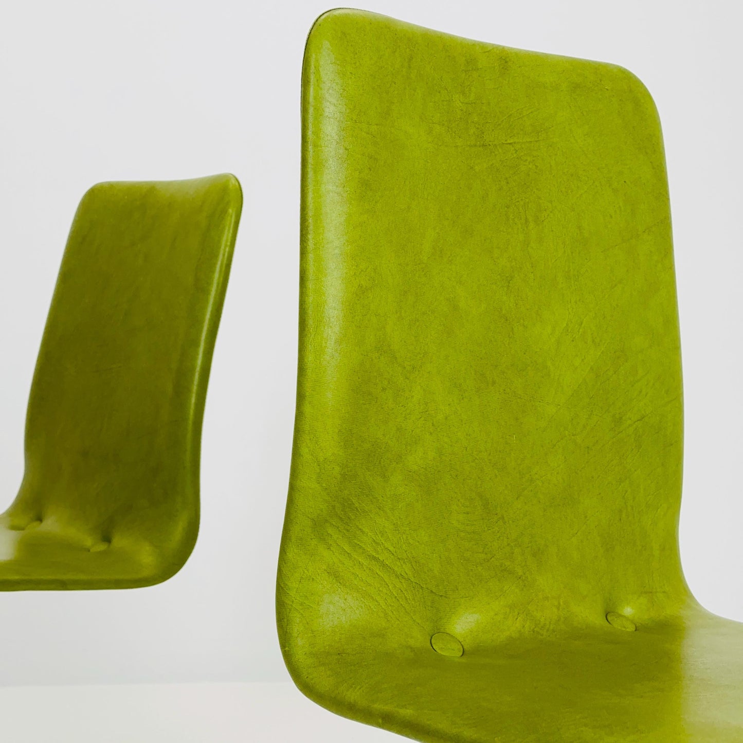 1 of 2 Bauhaus Mid-Century Lounge Swivel Chair — Chrome Base & Green faux leather — Germany, 1980s
