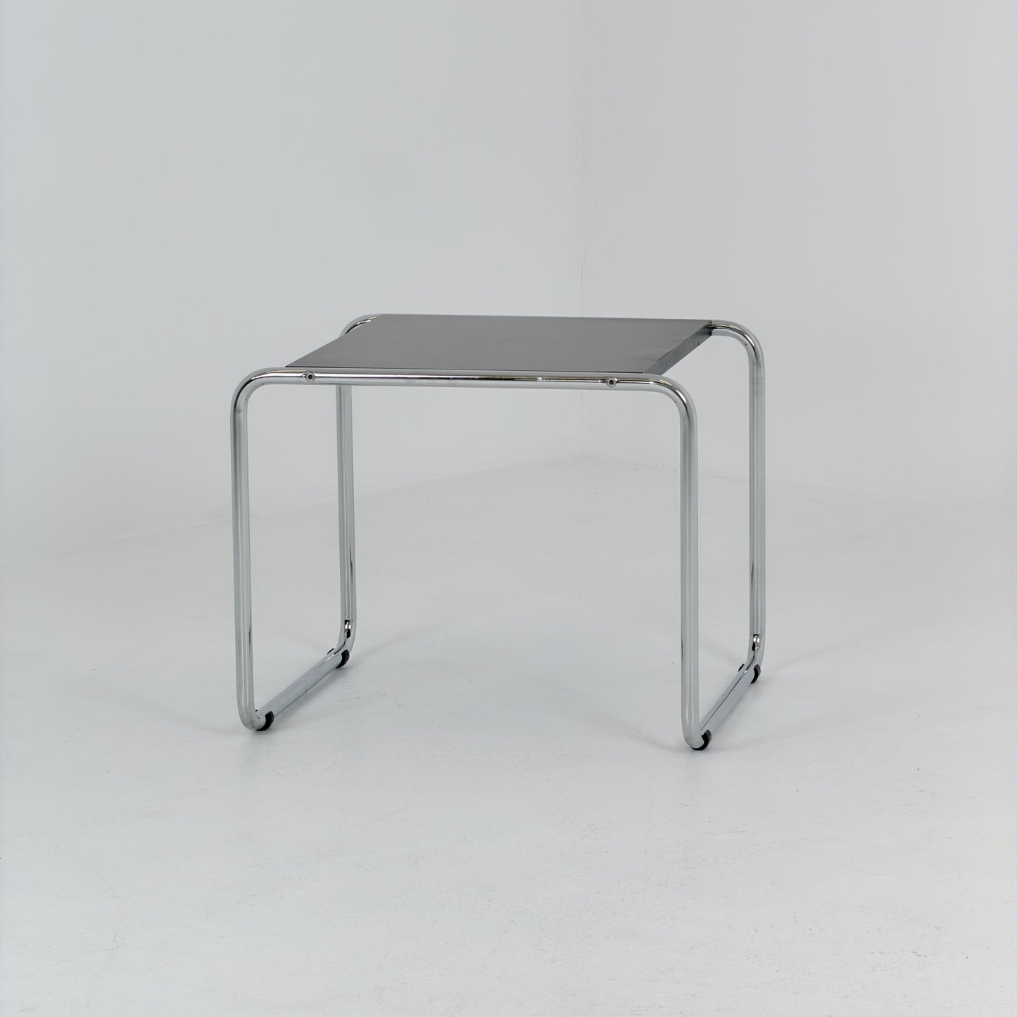 Mid century Bauhaus Marcel Breuer - Laccio Side coffee Table black Laminated Top with Tubular Chromed Base 1980s Itlay