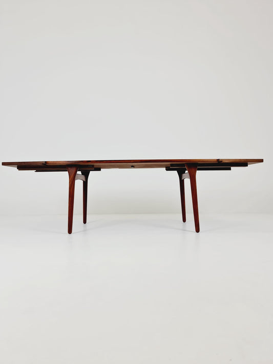 Danish Henning Kjaernulf Rosewood table with two extension leaves, Denmark 1960s