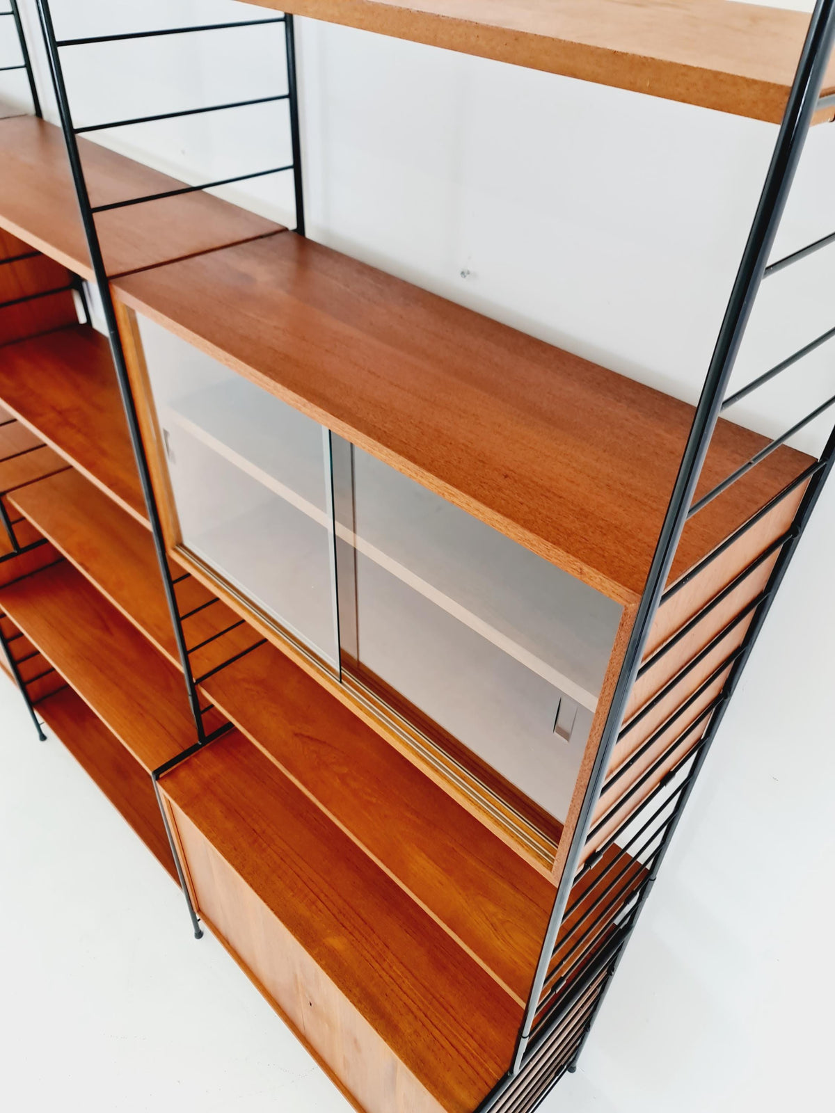 Mid century String shelf-system, bookcase with 3 cabinet and show case Teak wood by WHB Germany, 1950s
