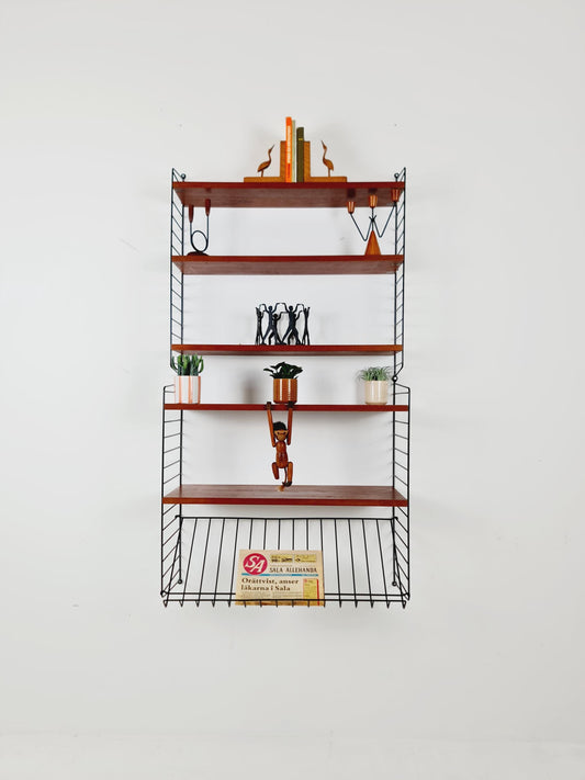 Original MCM Teak shelving system - consists of Black lacquered metal ladders, from string Stockholm 1960s