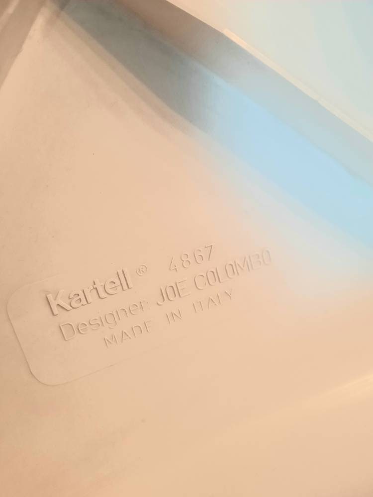 white model 4867 Universale plastic chair,designed in 1965 by Joe Colombo and manufactured by Kartell Italy. 