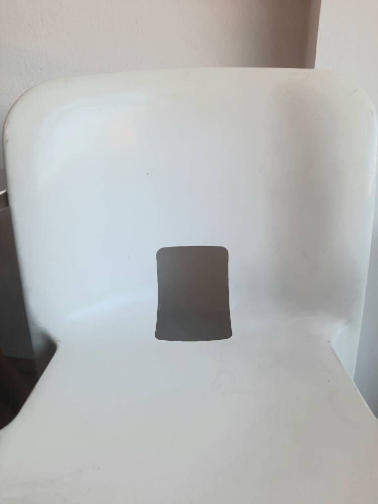 white model 4867 Universale plastic chair,designed in 1965 by Joe Colombo and manufactured by Kartell Italy. 