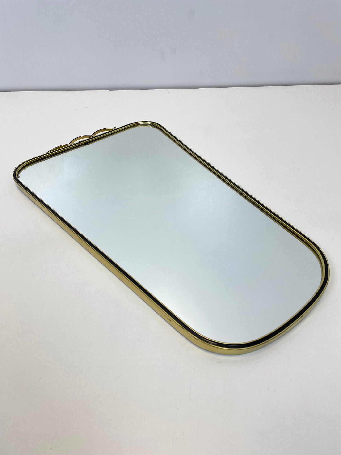 Mid Century asymmetric German brass Original kidney wall mirror with 2 brass hangers, 1960s