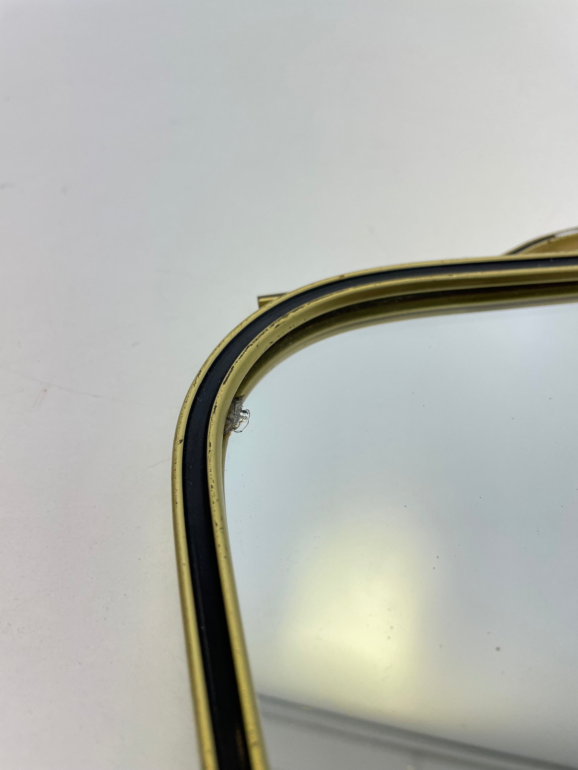 Mid Century asymmetric German brass Original kidney wall mirror with 2 brass hangers, 1960s