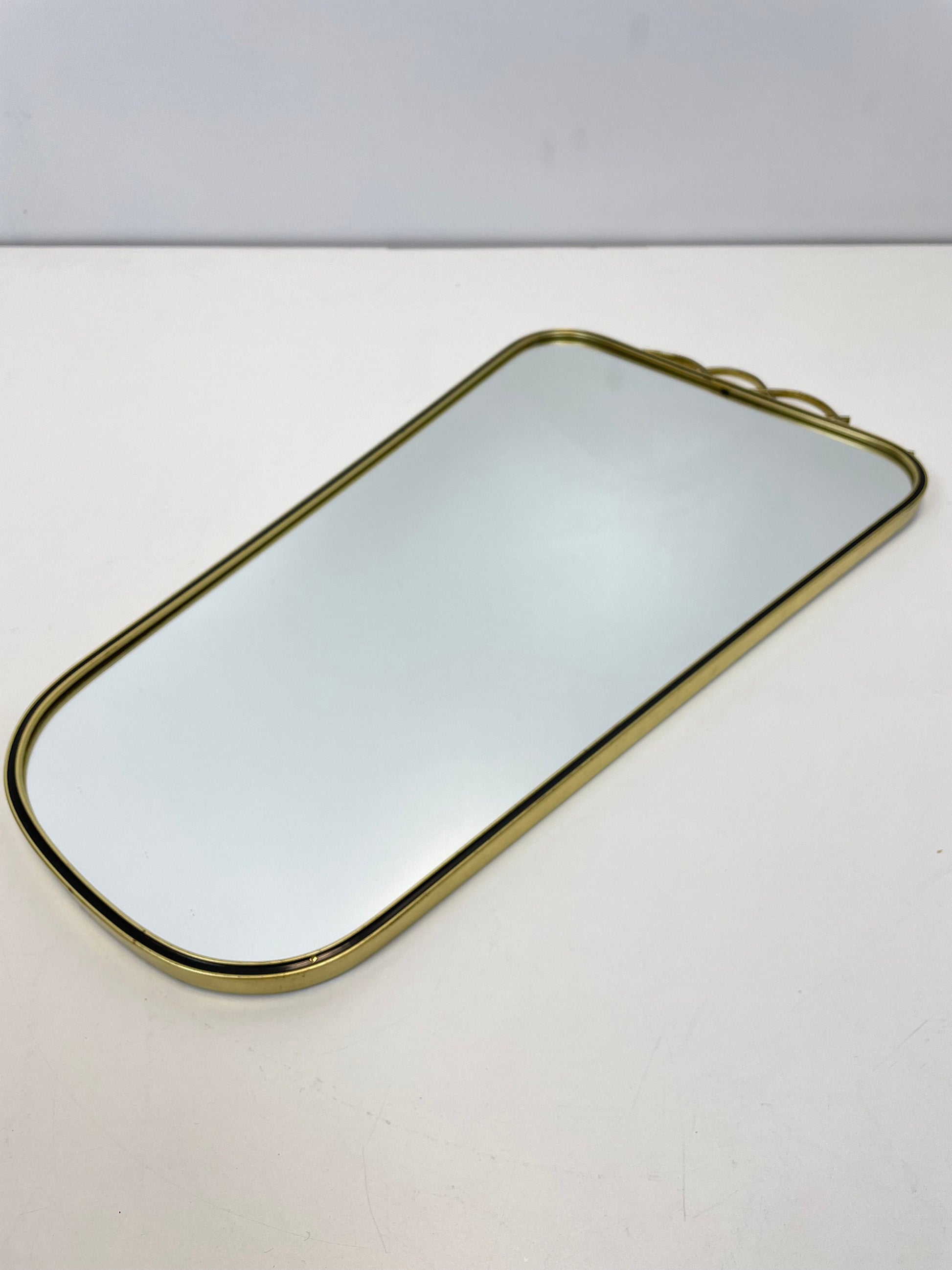 Mid Century asymmetric German brass Original kidney wall mirror with 2 brass hangers, 1960s