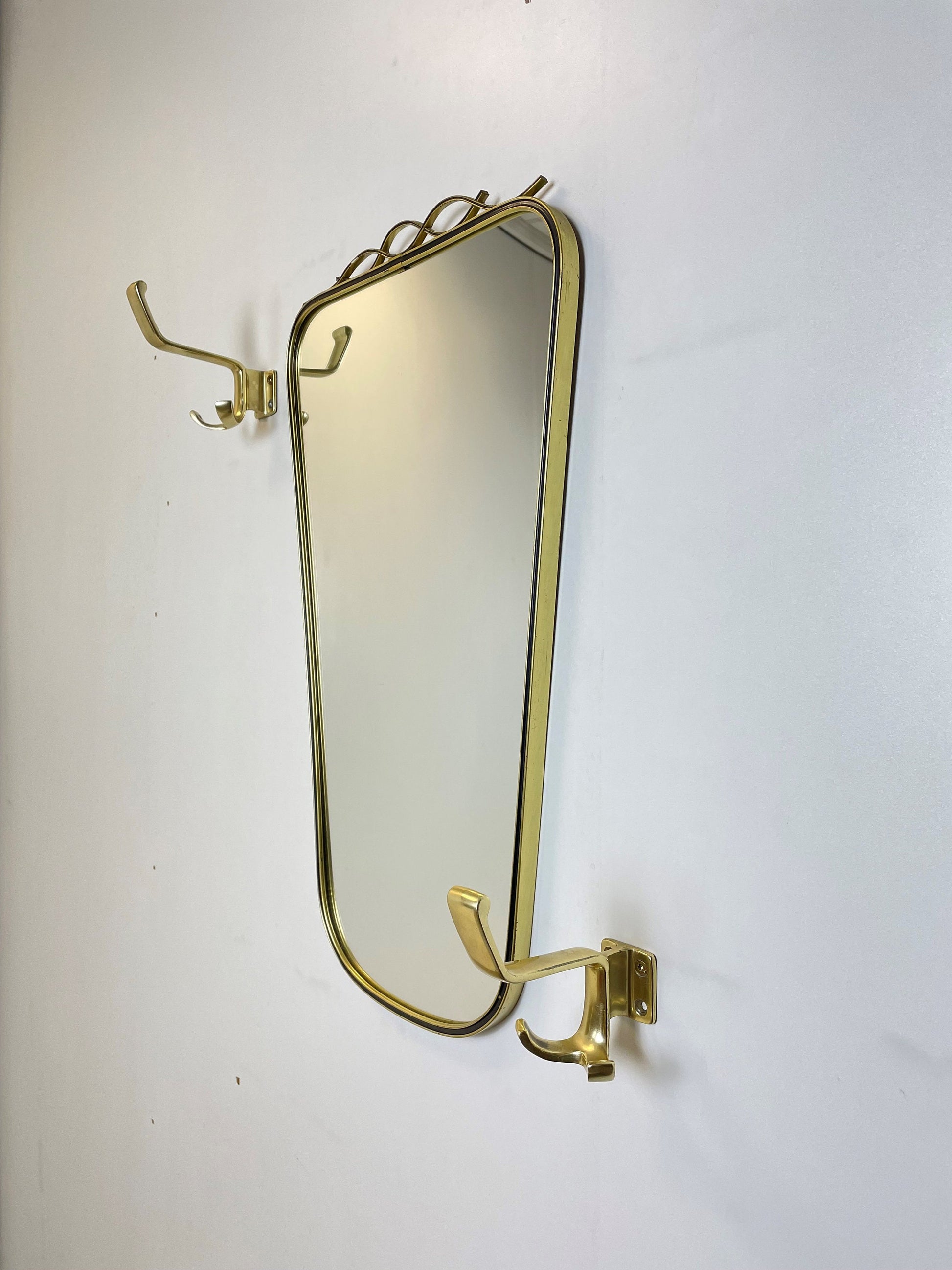 Mid Century asymmetric German brass Original kidney wall mirror with 2 brass hangers, 1960s